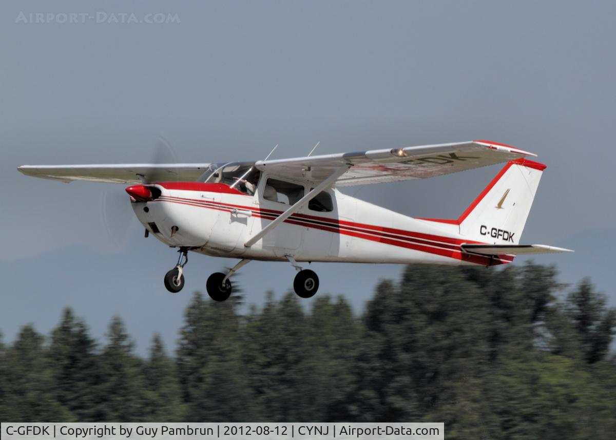 C-GFDK, 1962 Cessna 172C C/N 17248779, Taking off into the sun