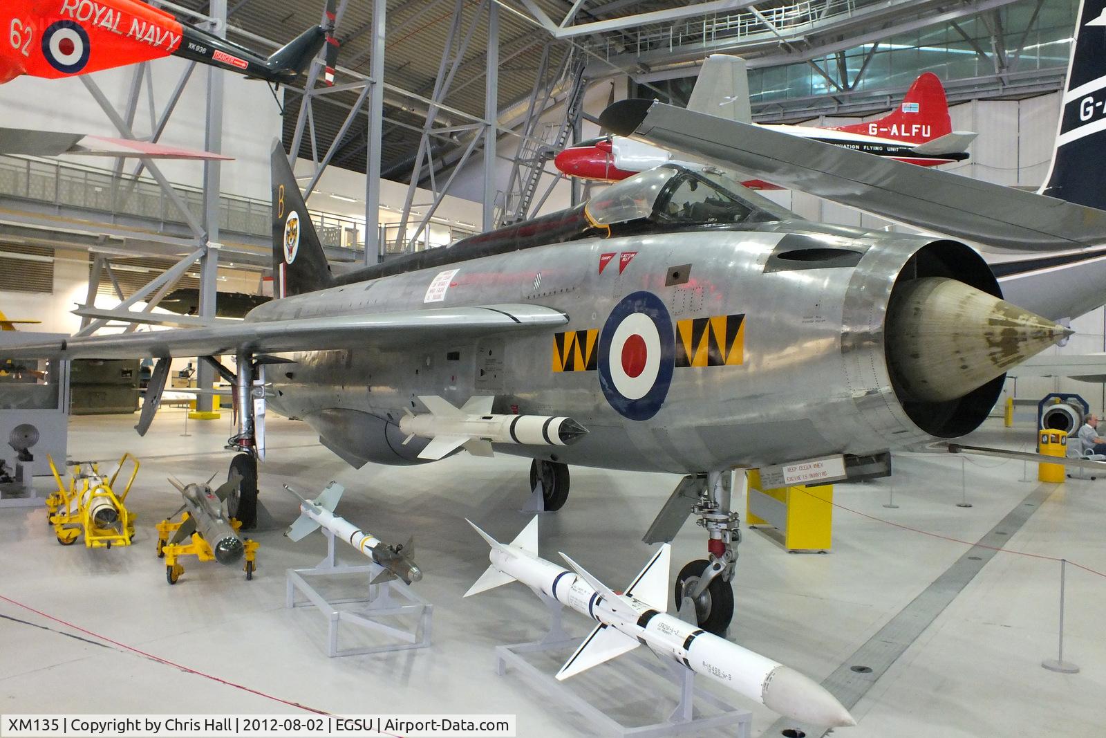 XM135, 1959 English Electric Lightning F.1 C/N 95031, In 74 'Tiger' squadron colours displayed inside the AirSpace hangar, Duxford