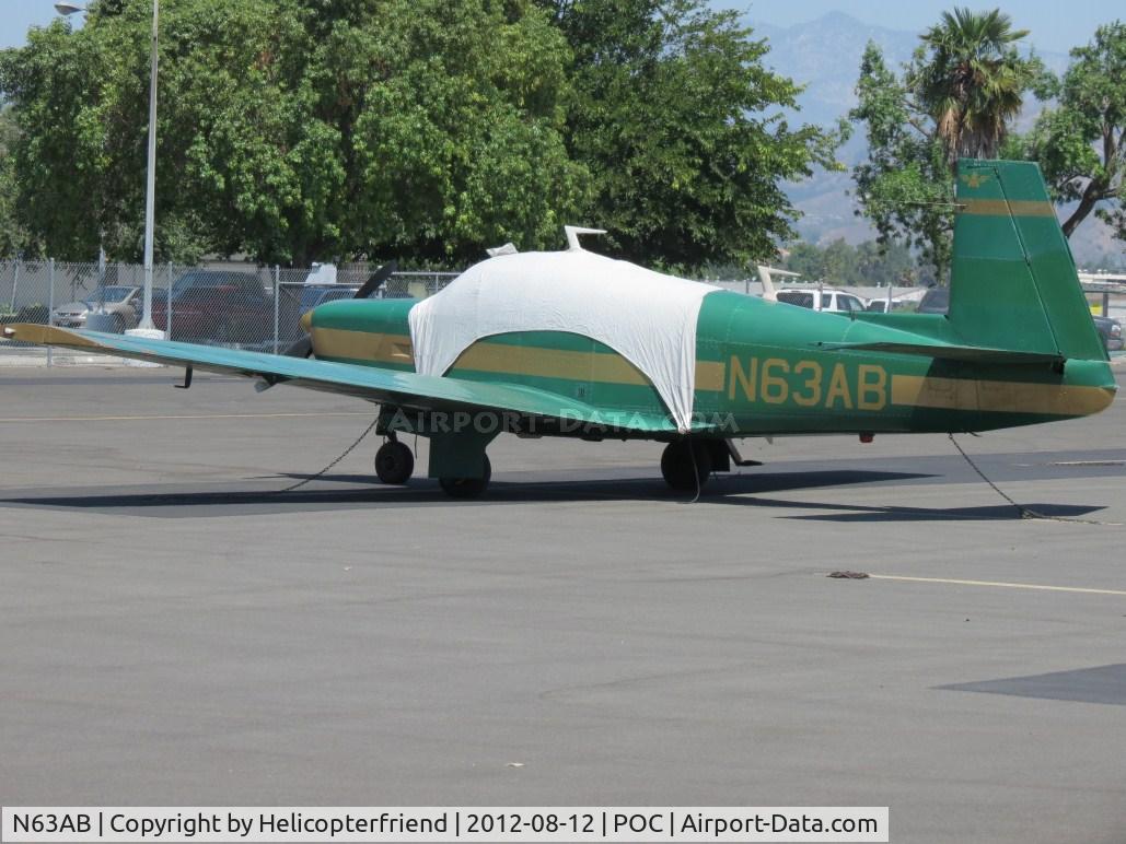 N63AB, 1965 Mooney M20E C/N 914, Covered, tied down & parked in transient parking