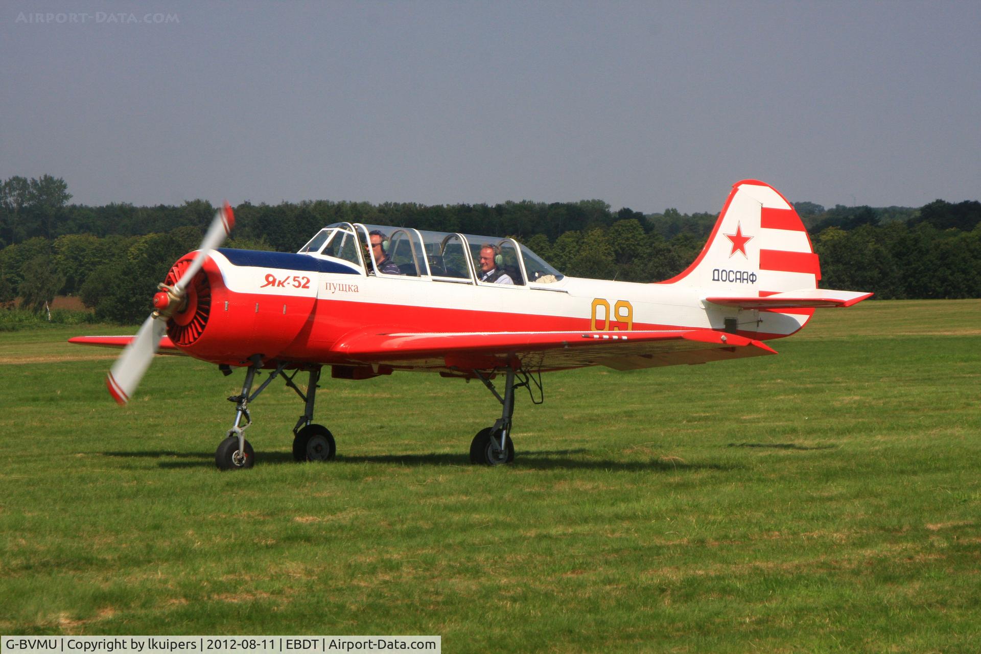 G-BVMU, 1994 Yakovlev (Aerostar) Yak-52 C/N 9411809, ready for departure from the 2012 Oldtimer Fly-in at Schaffen Diest