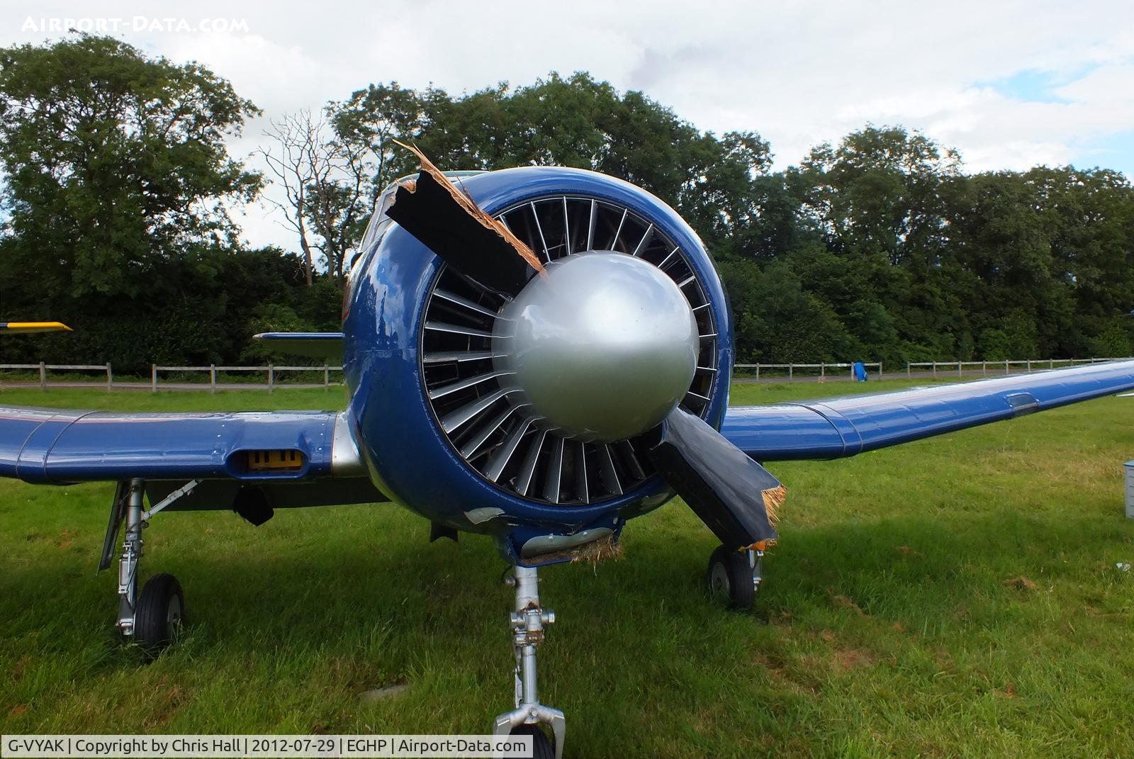 G-VYAK, 1993 Yakovlev Yak-18T C/N 01-32, damaged prop after a recent wheels up landing at Popham Airfield, Hampshire