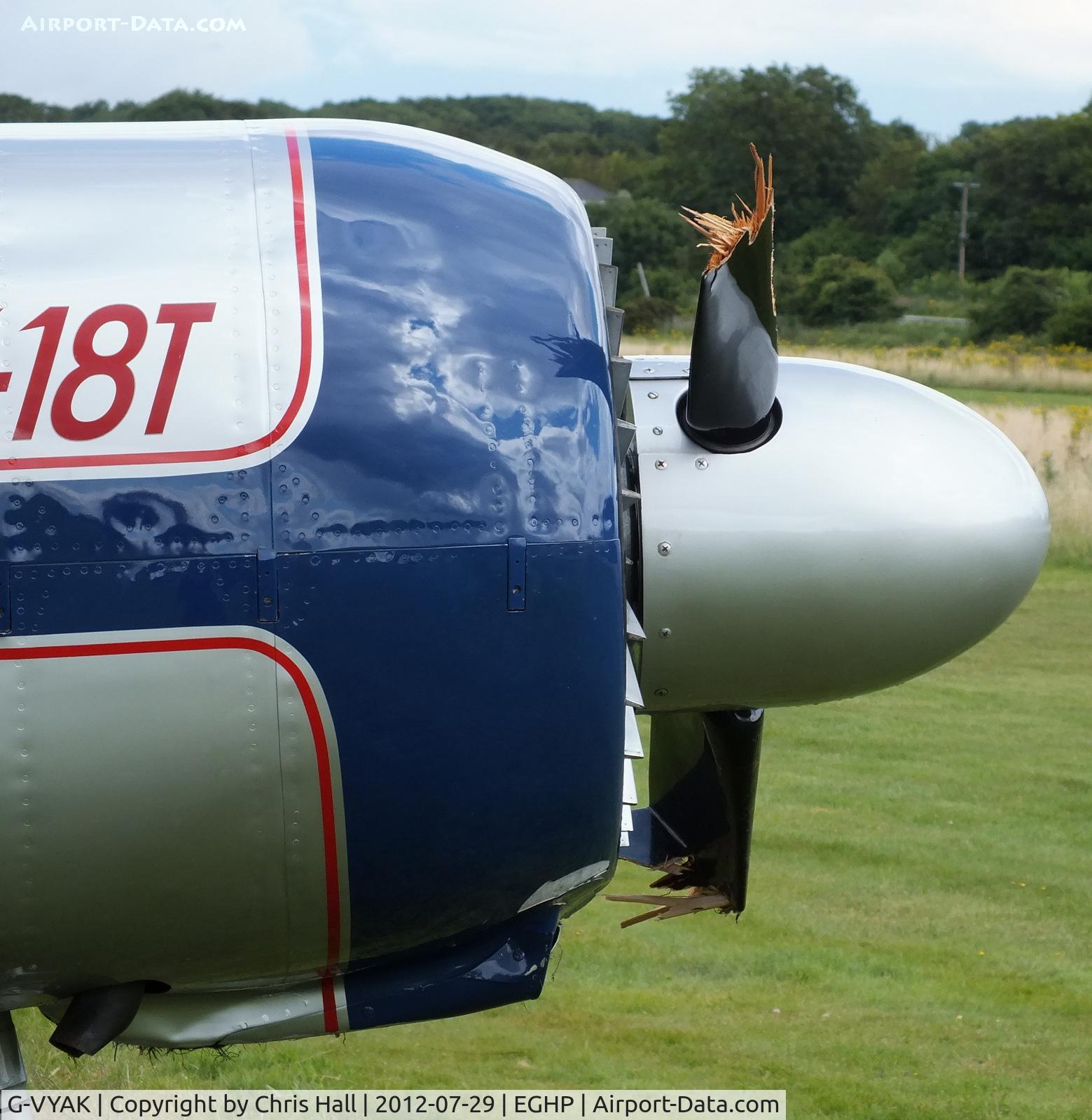 G-VYAK, 1993 Yakovlev Yak-18T C/N 01-32, damaged prop after a recent wheels up landing at Popham Airfield, Hampshire