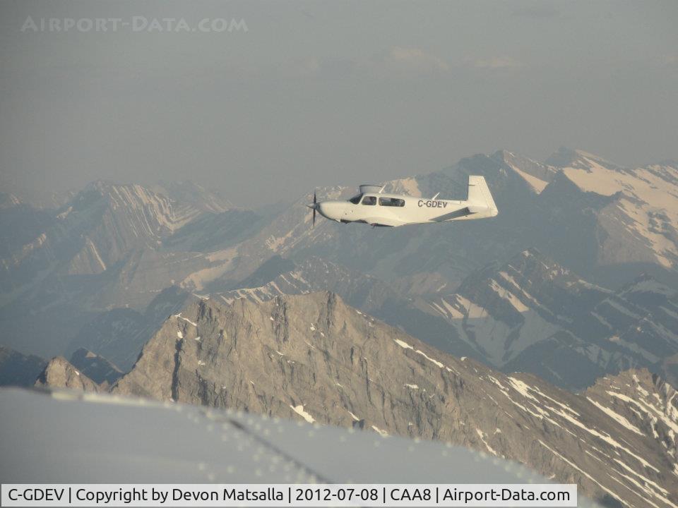 C-GDEV, 1990 Mooney M20M Bravo C/N 27-0067, C-GDEV over Canadian Rockies