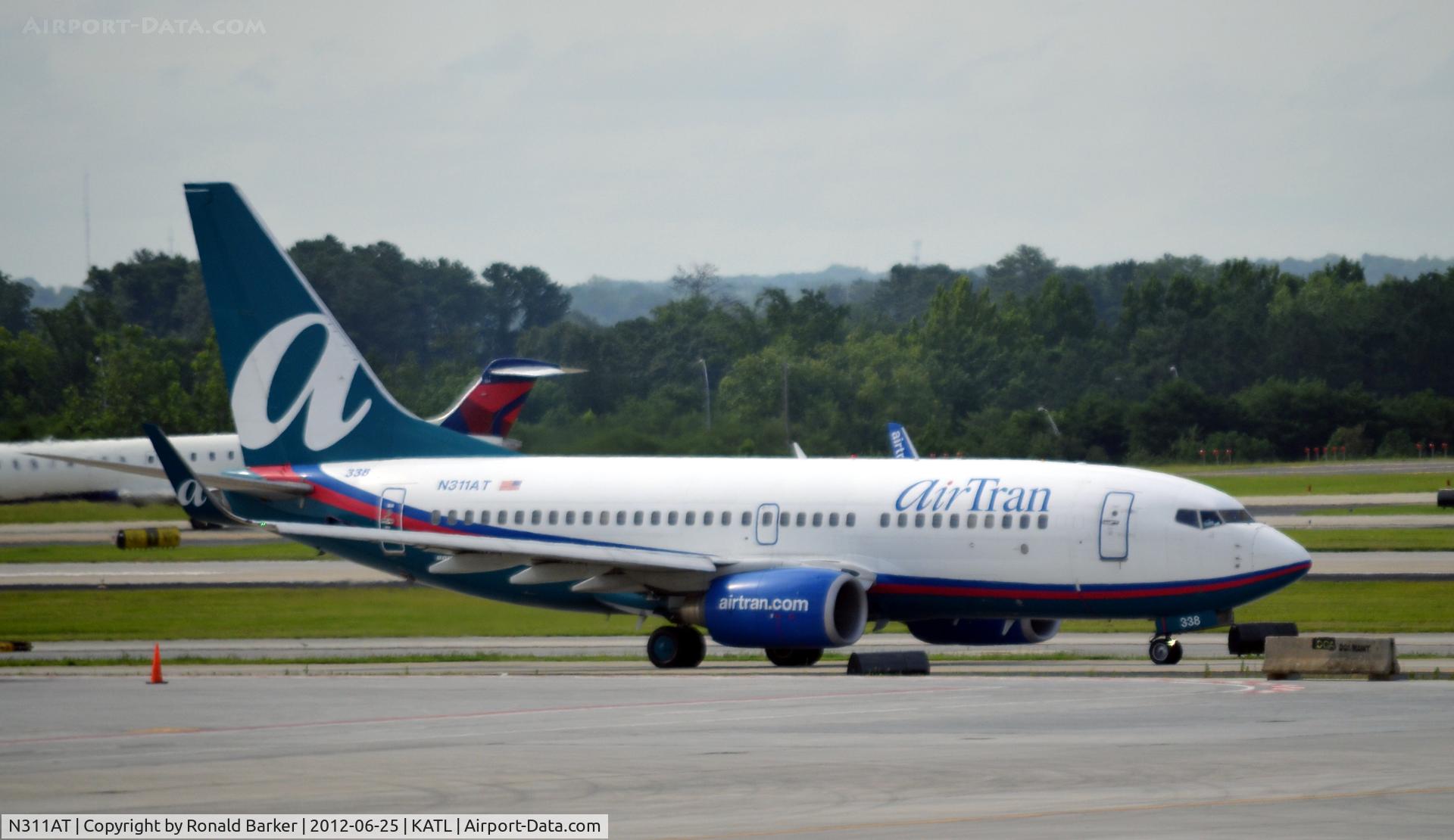N311AT, 2006 Boeing 737-7BD C/N 33930, Taxi ATL