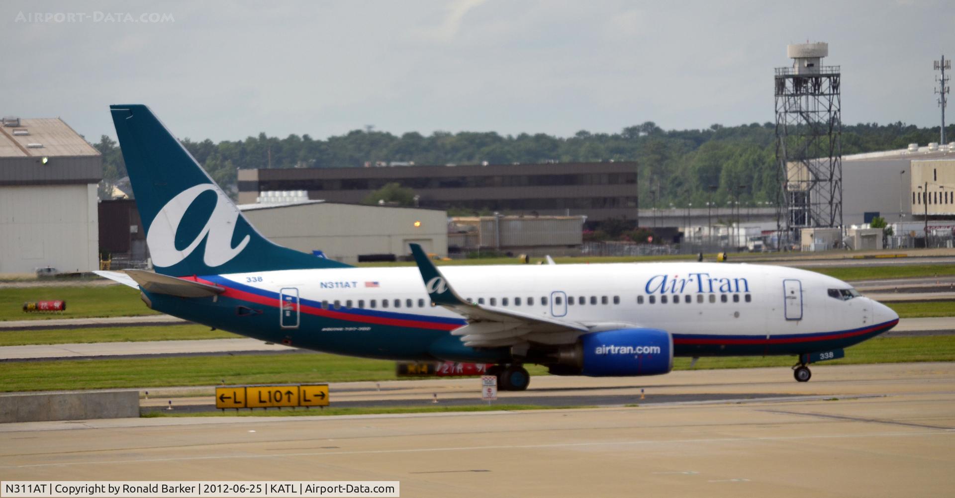 N311AT, 2006 Boeing 737-7BD C/N 33930, Taxi ATL