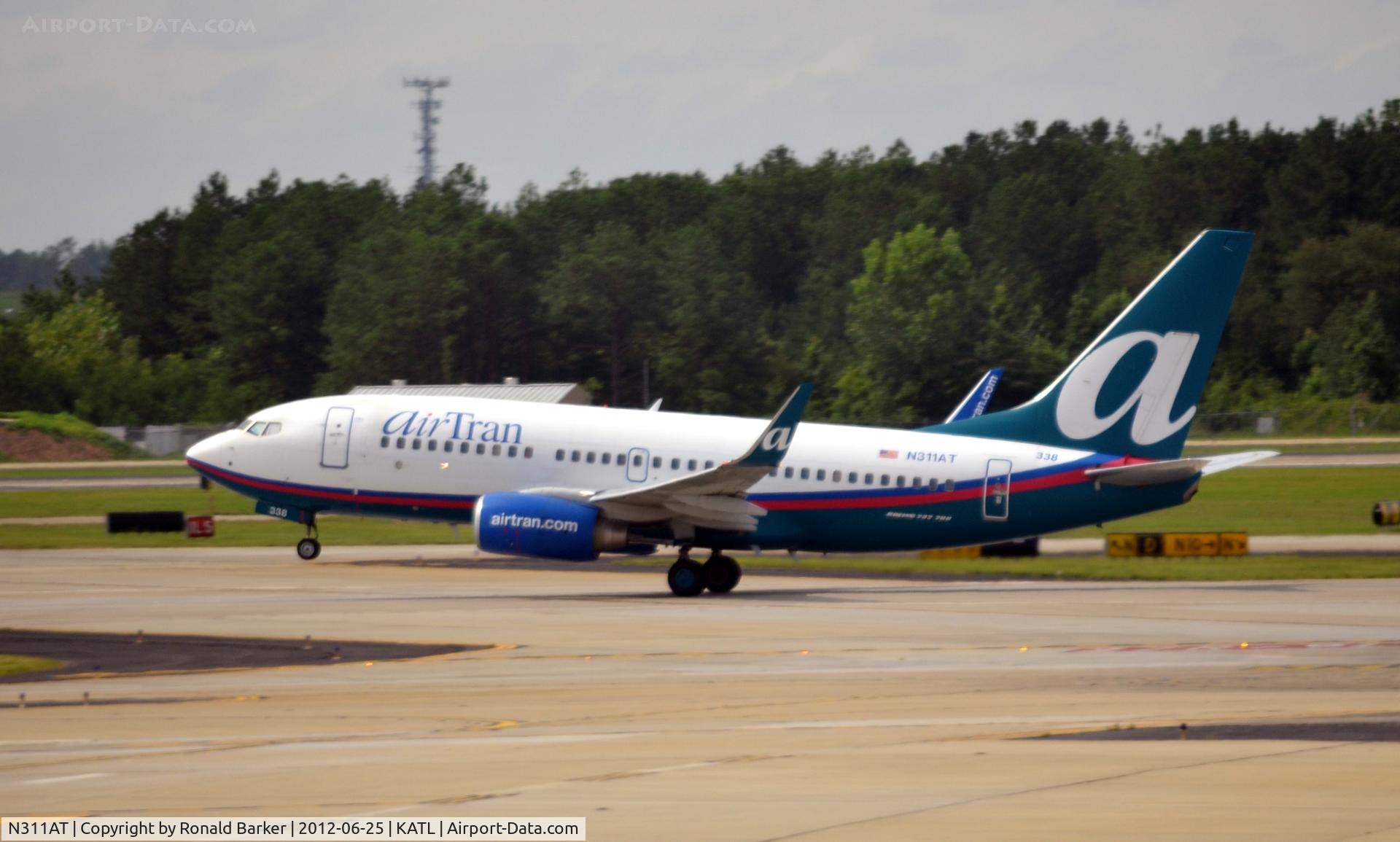 N311AT, 2006 Boeing 737-7BD C/N 33930, Takeoff ATL