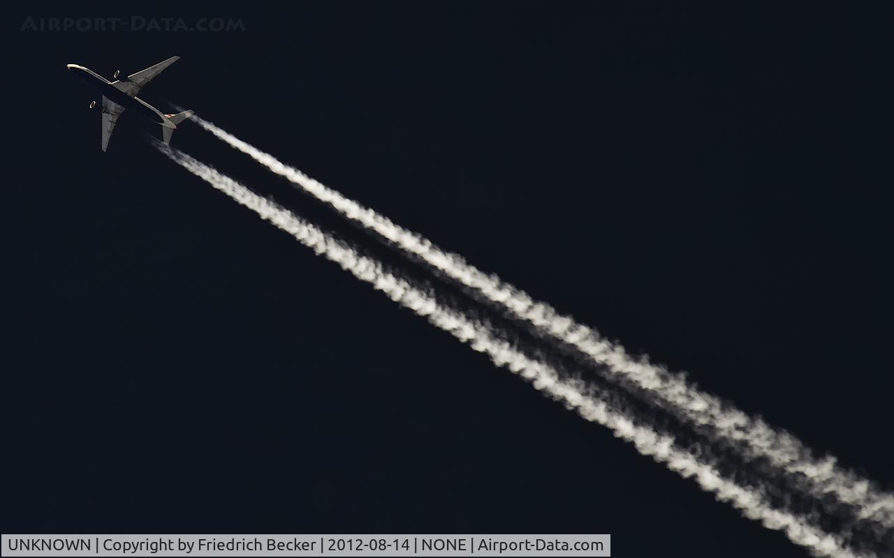 UNKNOWN, Contrails Various C/N Unknown, British Airways B777-236 cruising south-eastbound