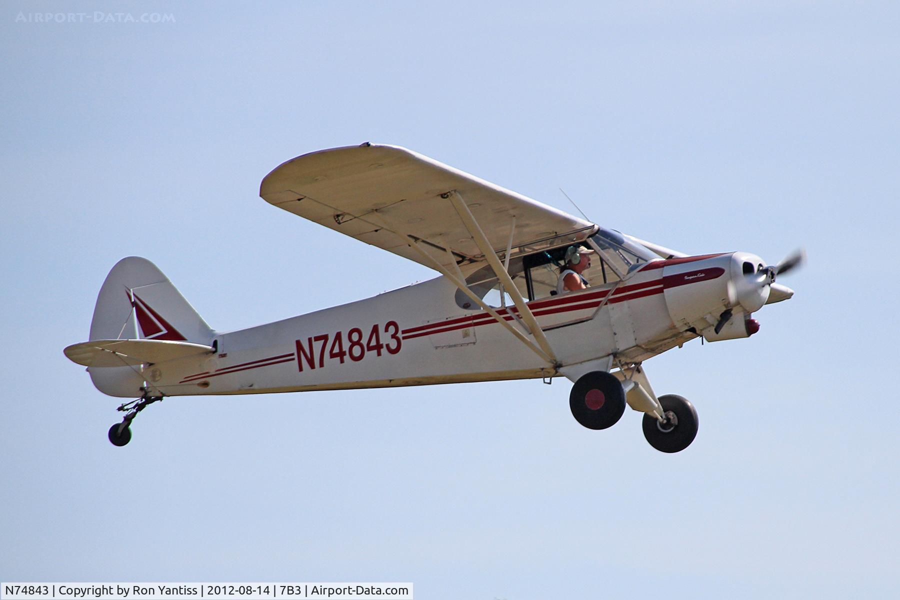 N74843, 1955 Piper PA-18-150 Super Cub C/N 18-4085, Climbing over the field and heading South