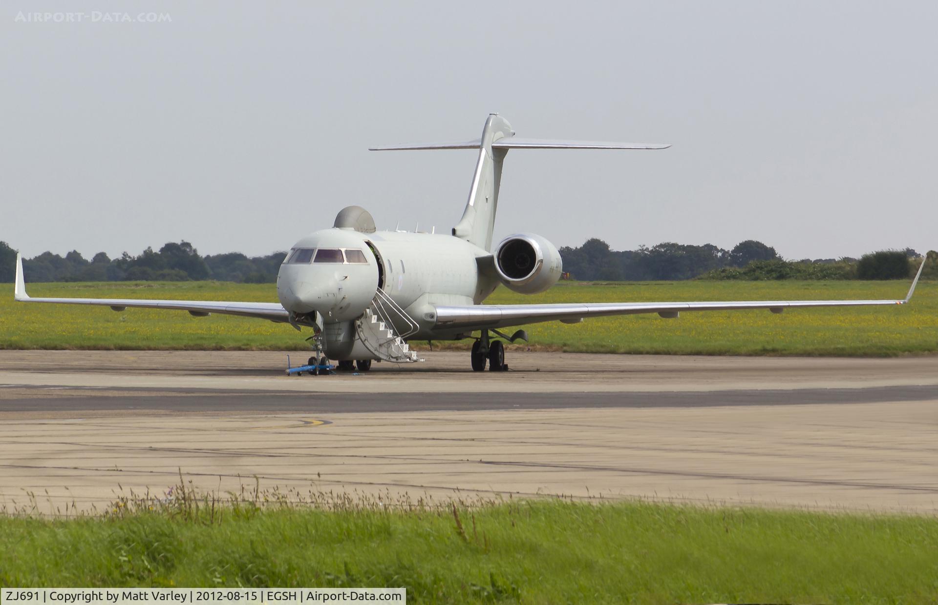 ZJ691, 2002 Bombardier BD-700-1A10 Sentinel R1 C/N 9123, Sat on stand 7 after arriving for spray by Air Livery.
