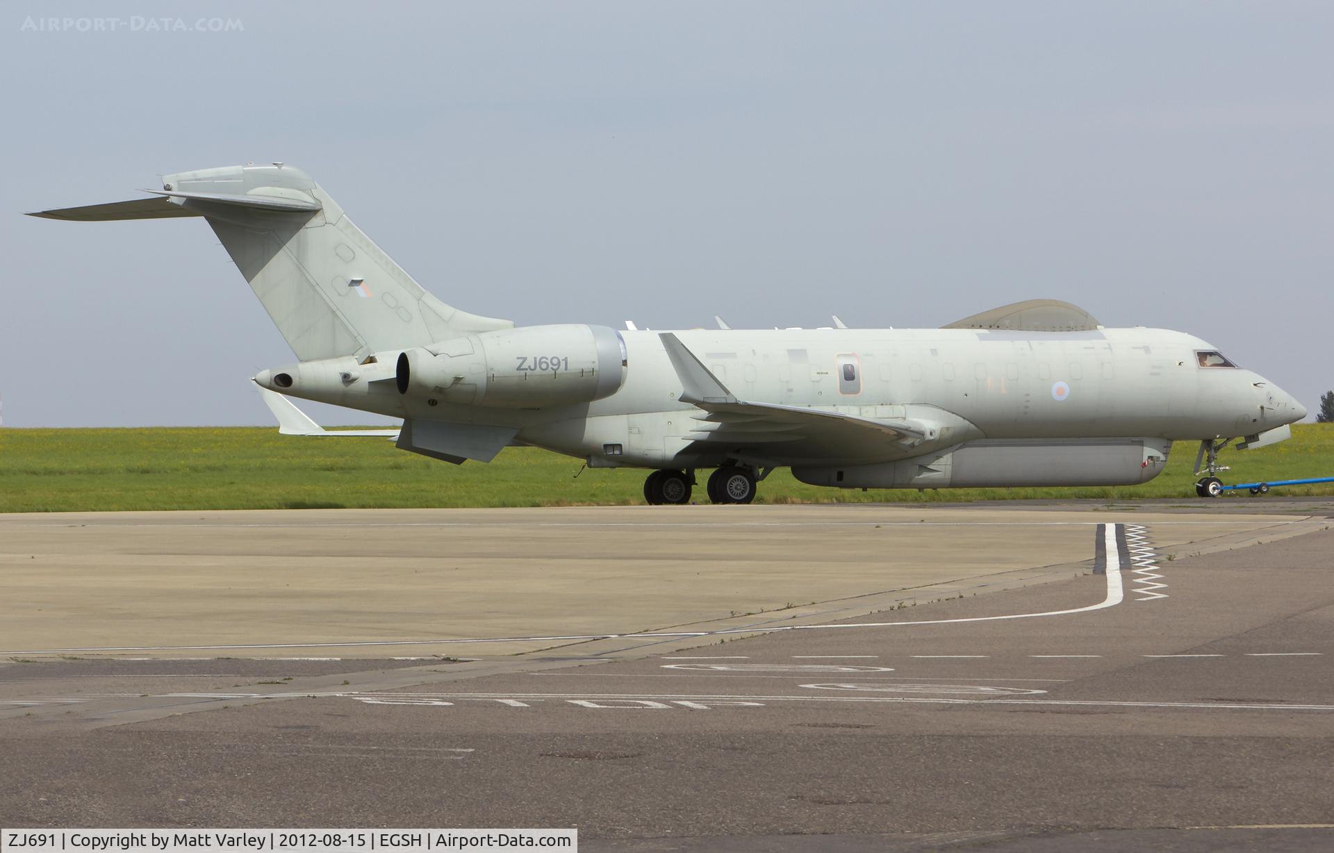 ZJ691, 2002 Bombardier BD-700-1A10 Sentinel R1 C/N 9123, Being towed to the Air Livery hangar for spray.