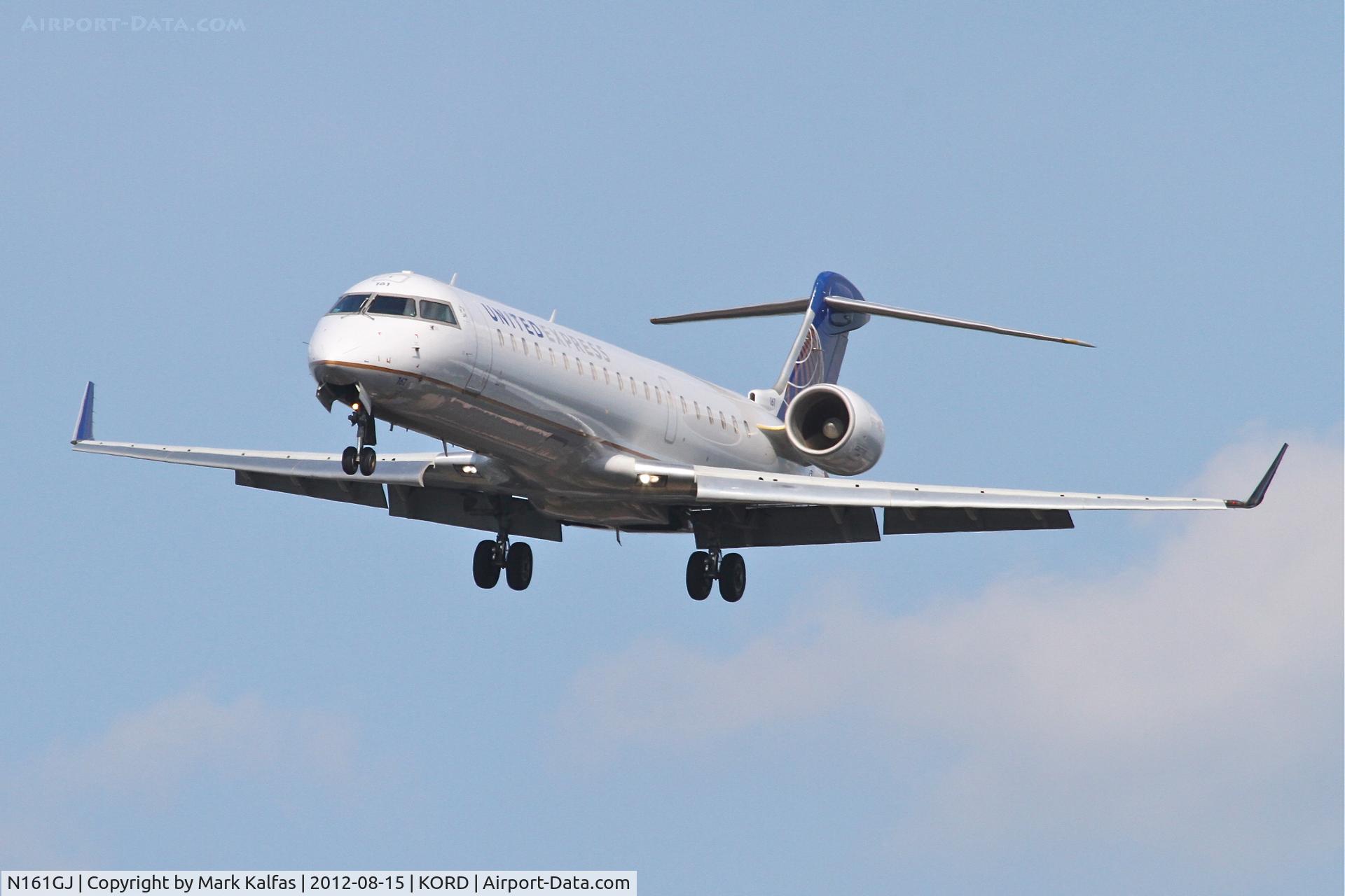 N161GJ, 2006 Bombardier CRJ-550 (CL-600-2C11) C/N 10253, GoJet Airlines/United Express Bombardier CL-600-2C10/CRJ7, freshly painted in the new color scheme - arriving from New Orleans/KMSY, RWY 28 approach KORD.