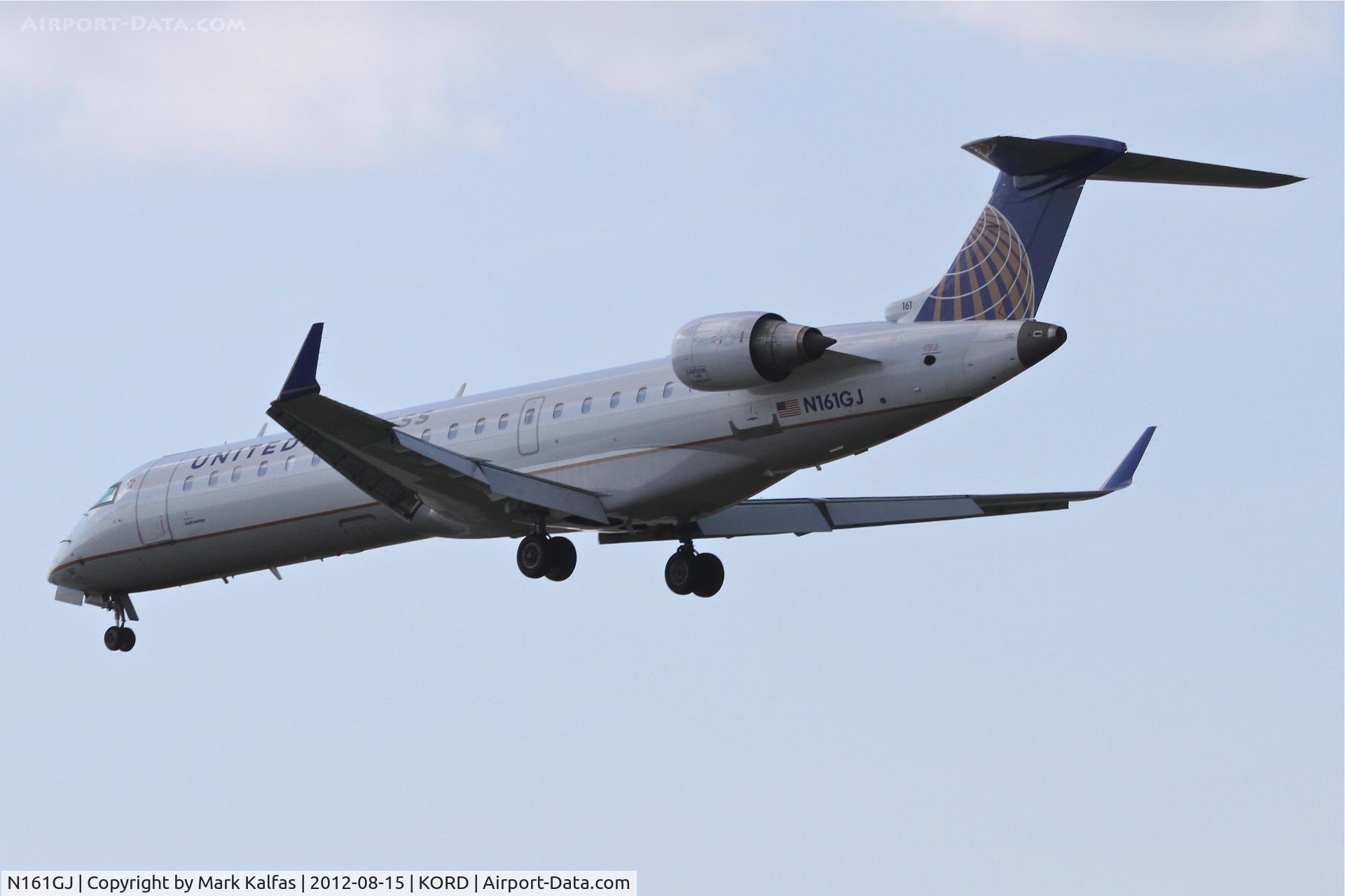 N161GJ, 2006 Bombardier CRJ-550 (CL-600-2C11) C/N 10253, GoJet Airlines/United Express Bombardier CL-600-2C10/CRJ7, freshly painted in the new color scheme - arriving from New Orleans/KMSY, RWY 28 approach KORD.