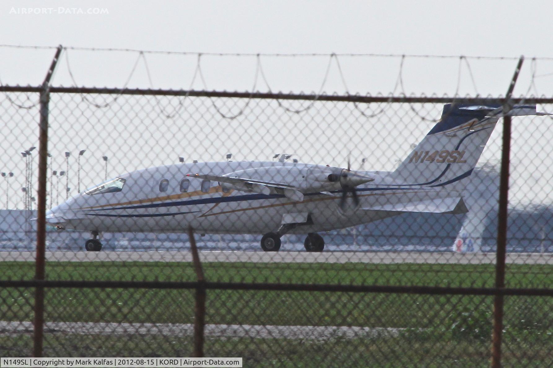N149SL, 2003 Piaggio P-180 C/N 1077, Avantair149, Piaggio P-180 Avanti, departing RWY 22L KORD enroute to Lovell Field/KCHA.