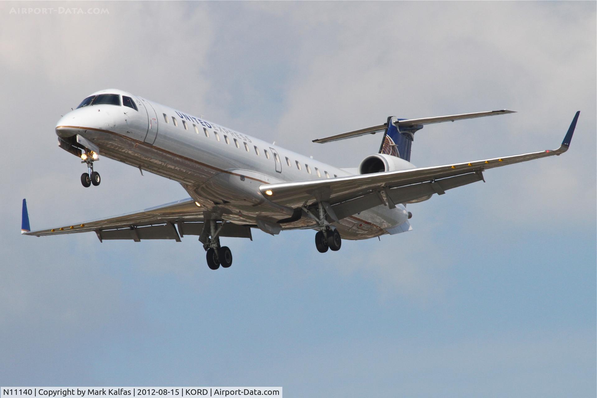 N11140, 2003 Embraer ERJ-145XR (EMB-145XR) C/N 145732, ExpressJet/United Express Embraer EMB-145XR, ASQ6043 arriving from Wichita Mid-Continent/KICT, RWY 28 approach KORD.