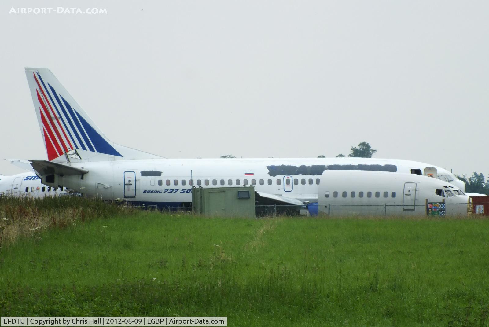 EI-DTU, 1991 Boeing 737-5Y0 C/N 25175, Transaero Airlines B737 in the scrapping area at Kemble