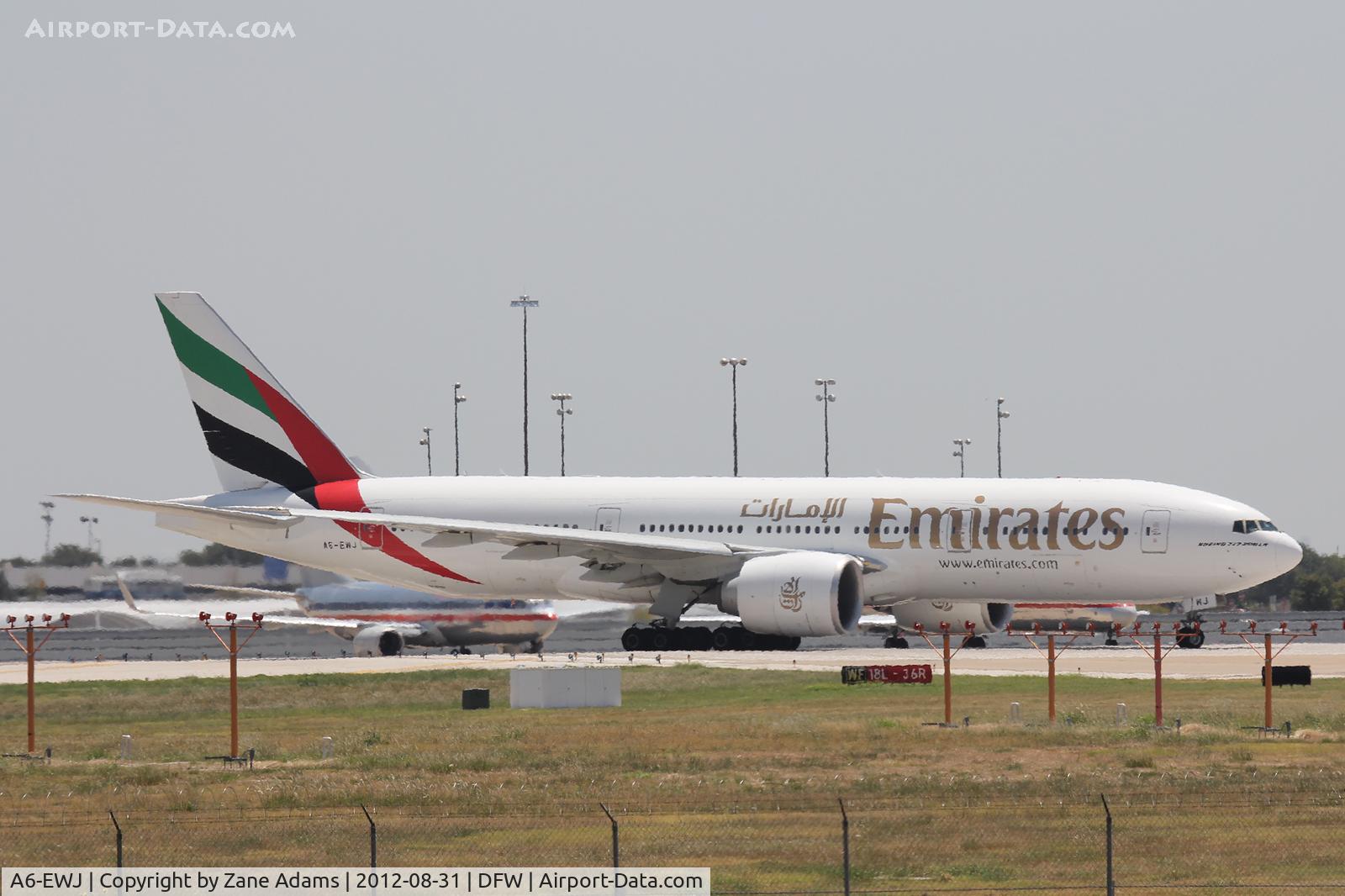 A6-EWJ, 2009 Boeing 777-21H/LR C/N 35590, Departing DFW Airport