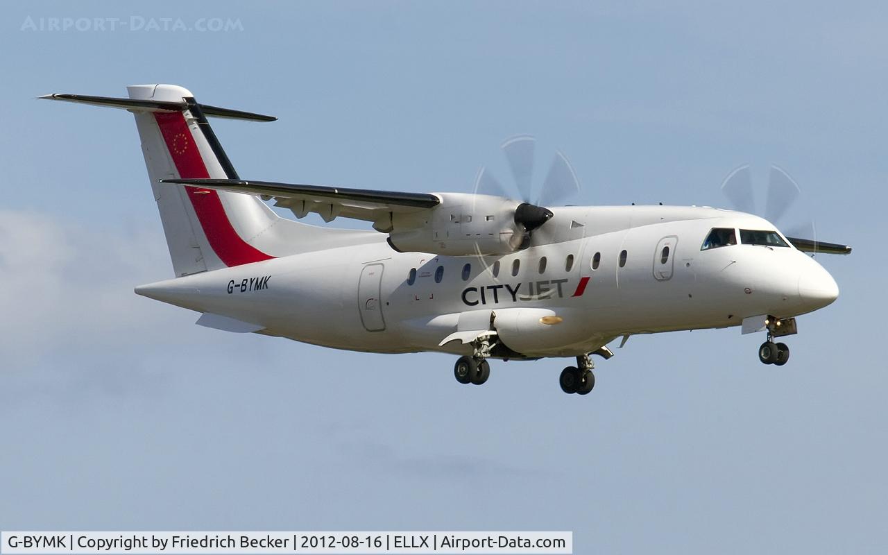 G-BYMK, 1996 Dornier 328-100 C/N 3062, on final RW24