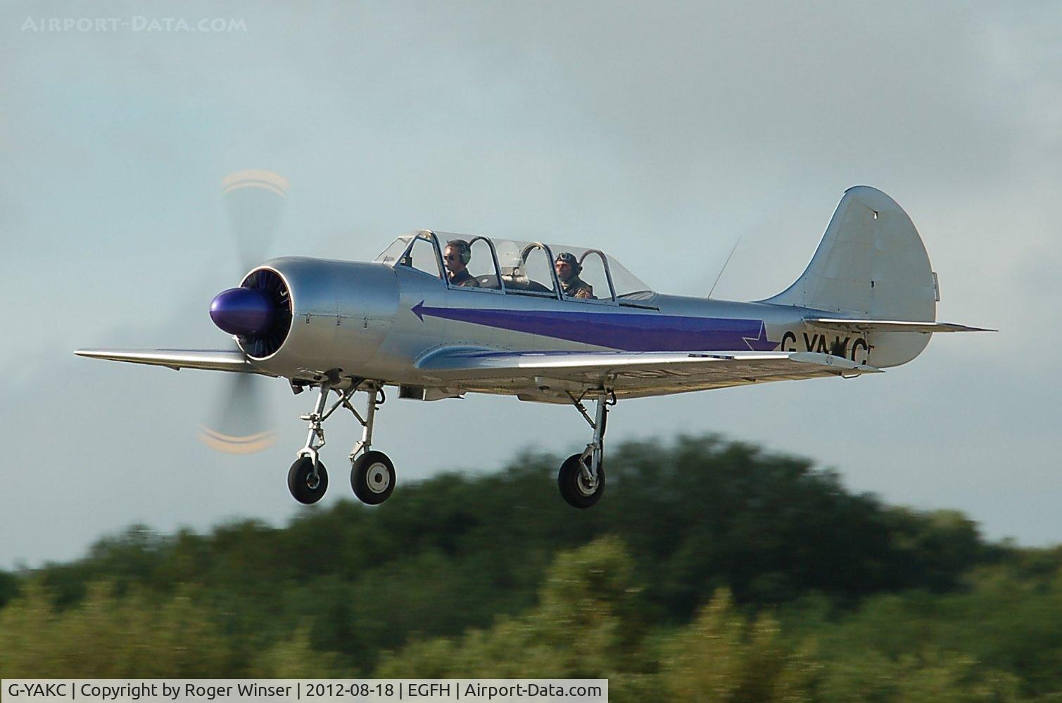 G-YAKC, 1986 Yakovlev Yak-52 C/N 867212, Resident Yak-52 departing Swansea Airport for a local flight. Previous registration LY-AKC.