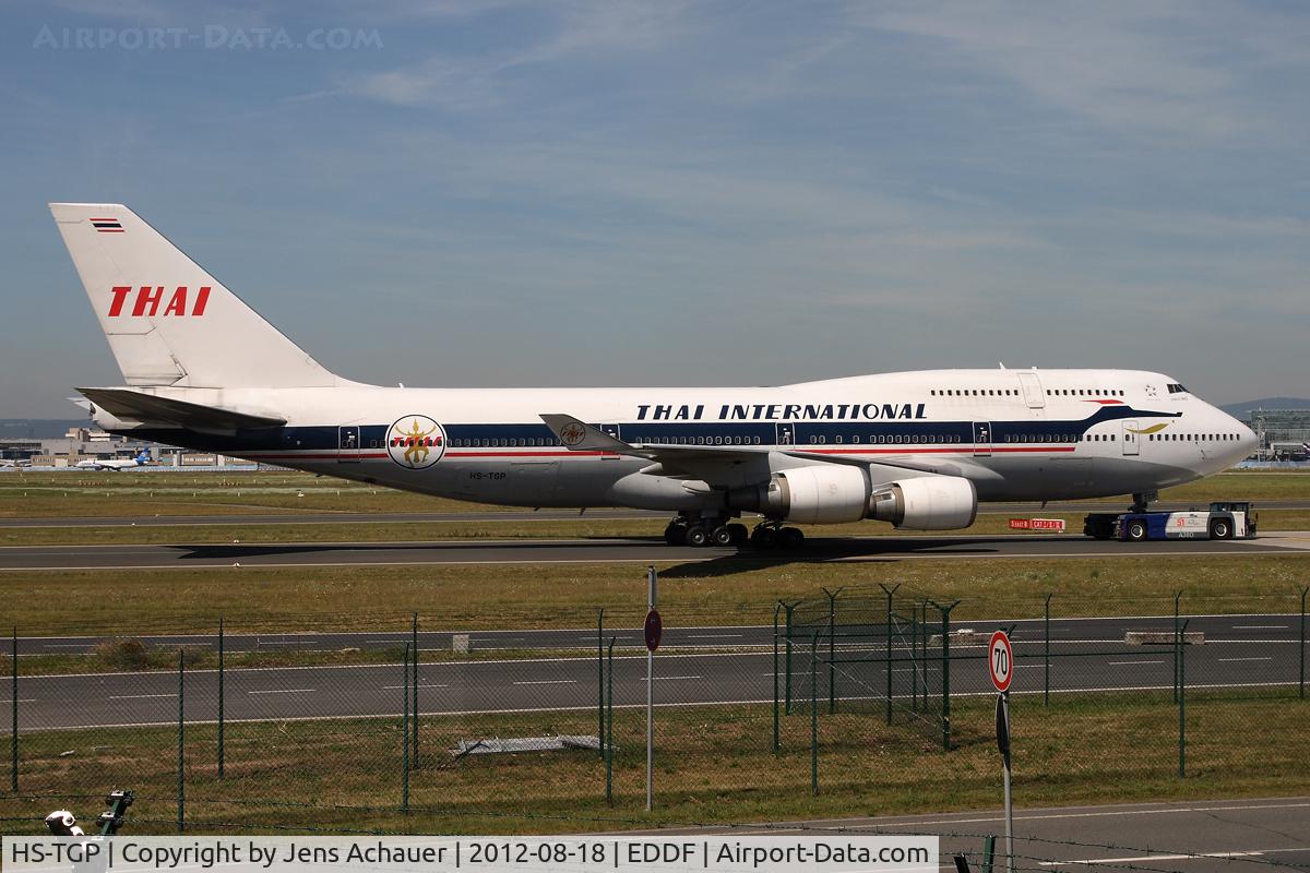 HS-TGP, 1994 Boeing 747-4D7 C/N 26610, Being towed to the terminal