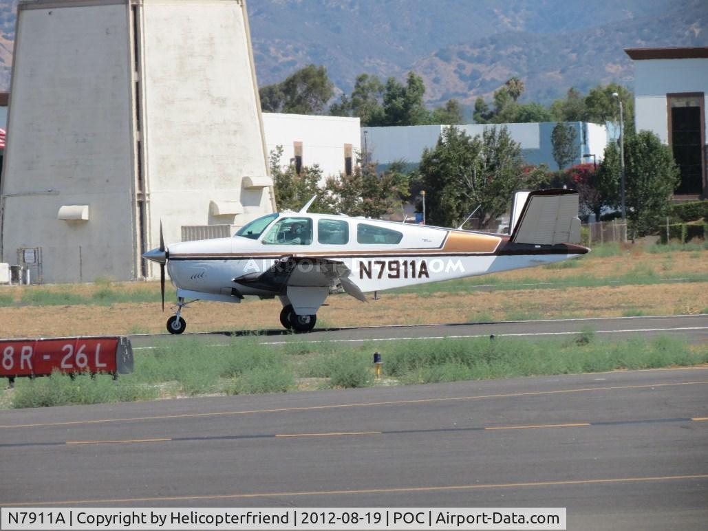 N7911A, 1964 Beech S35 Bonanza C/N D-7490, Rolling out after landing on 26L