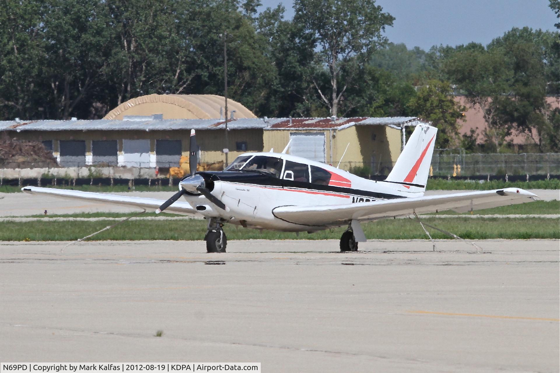N69PD, 1960 Piper PA-24-250 Comanche C/N 24-1377, PA-24-250, Piper Camanche 250 on the ramp at DuPage.