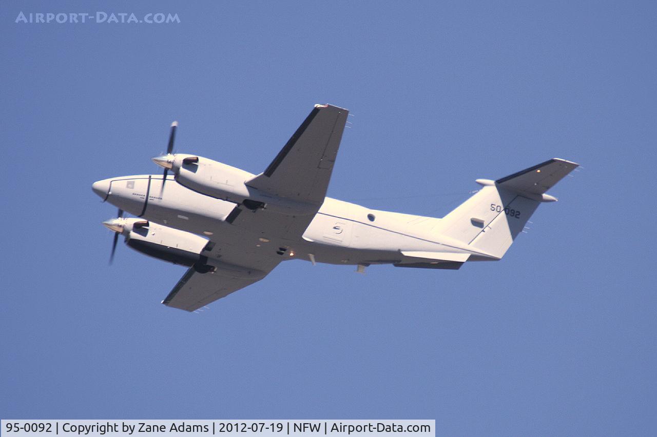95-0092, 1995 Beech C-12R Huron C/N BW-020, Departing NAS Fort Worth in new gray paint.