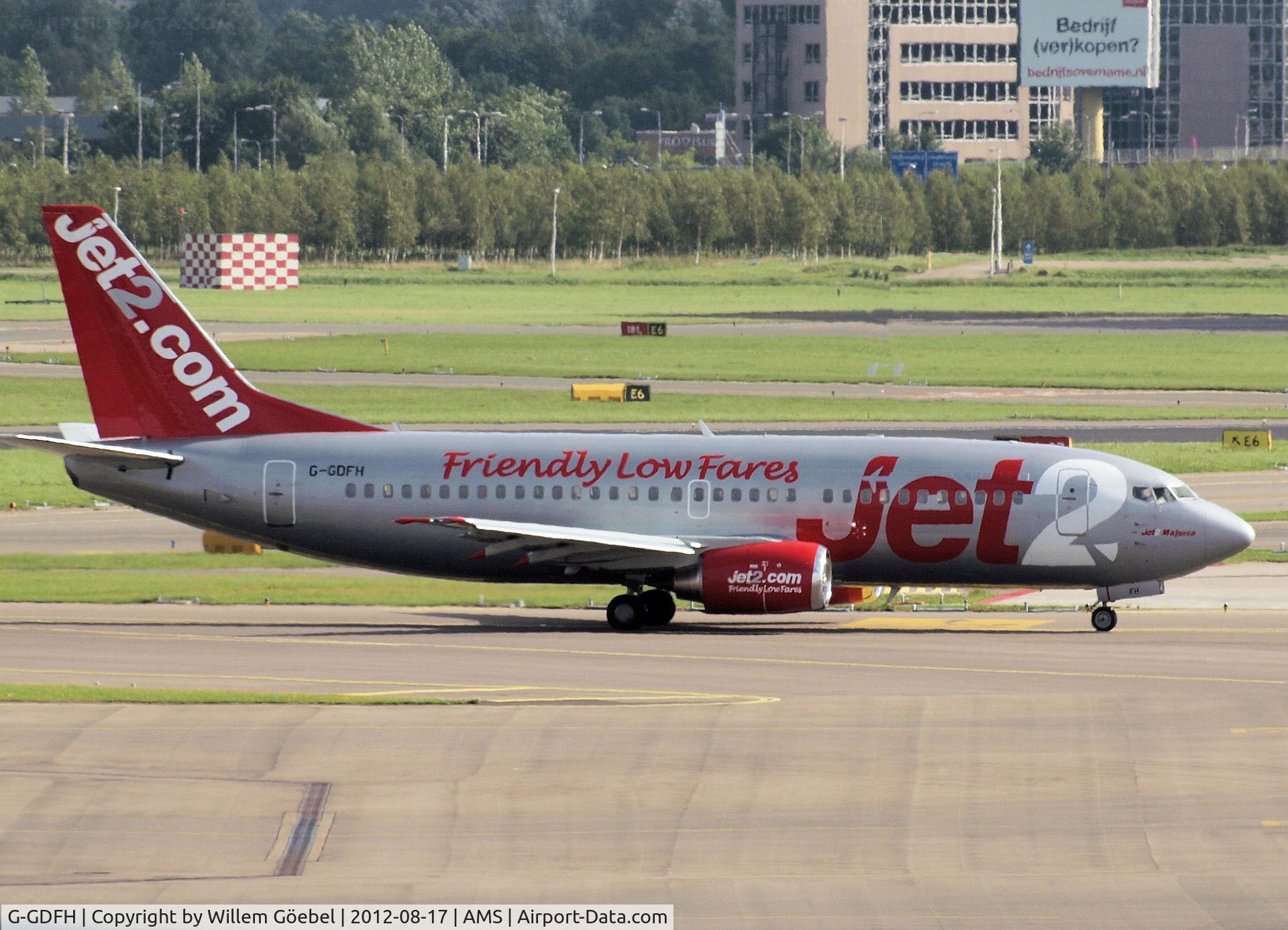 G-GDFH, 1993 Boeing 737-3Y5 C/N 25615, Taxi to runway 24 of Schiphol Airport for take off.
