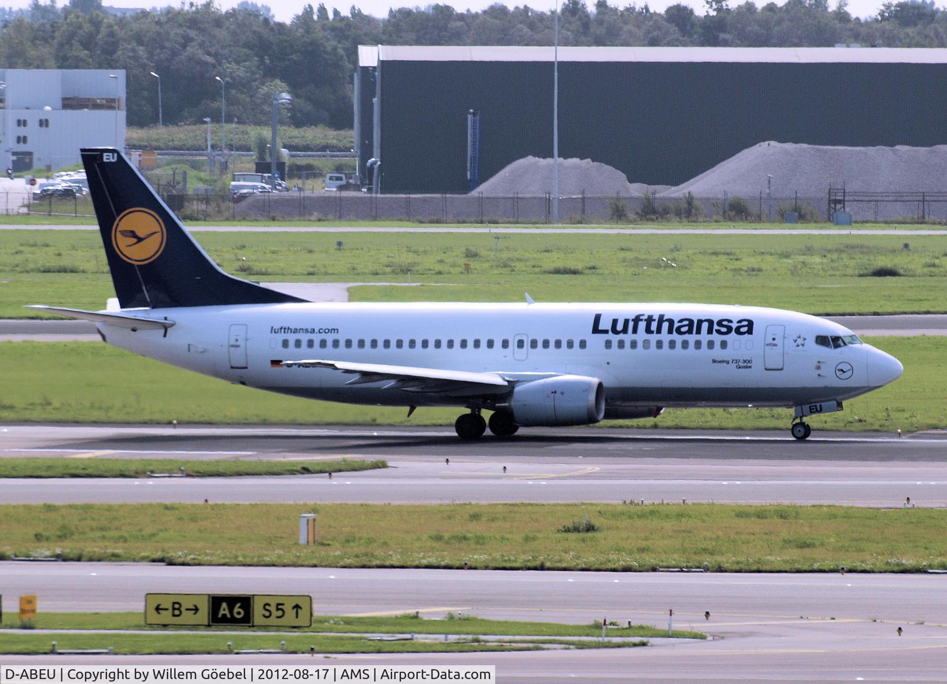 D-ABEU, 1995 Boeing 737-330 C/N 27904, Taxi to runway 24 of Schiphol Airport for take off.