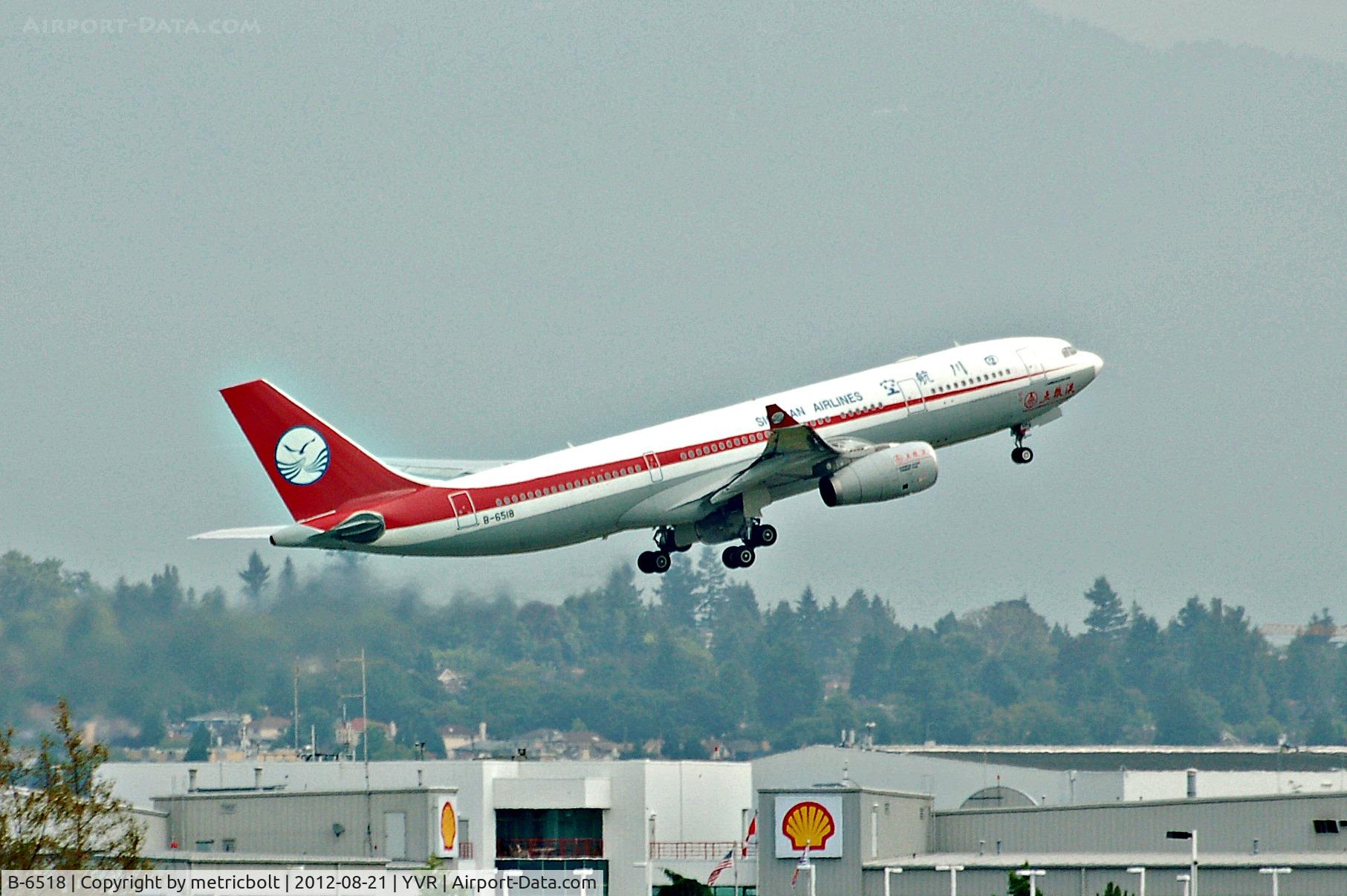 B-6518, 2010 Airbus A330-243 C/N 1082, Departure to Chengdu(Note caption below forward door: