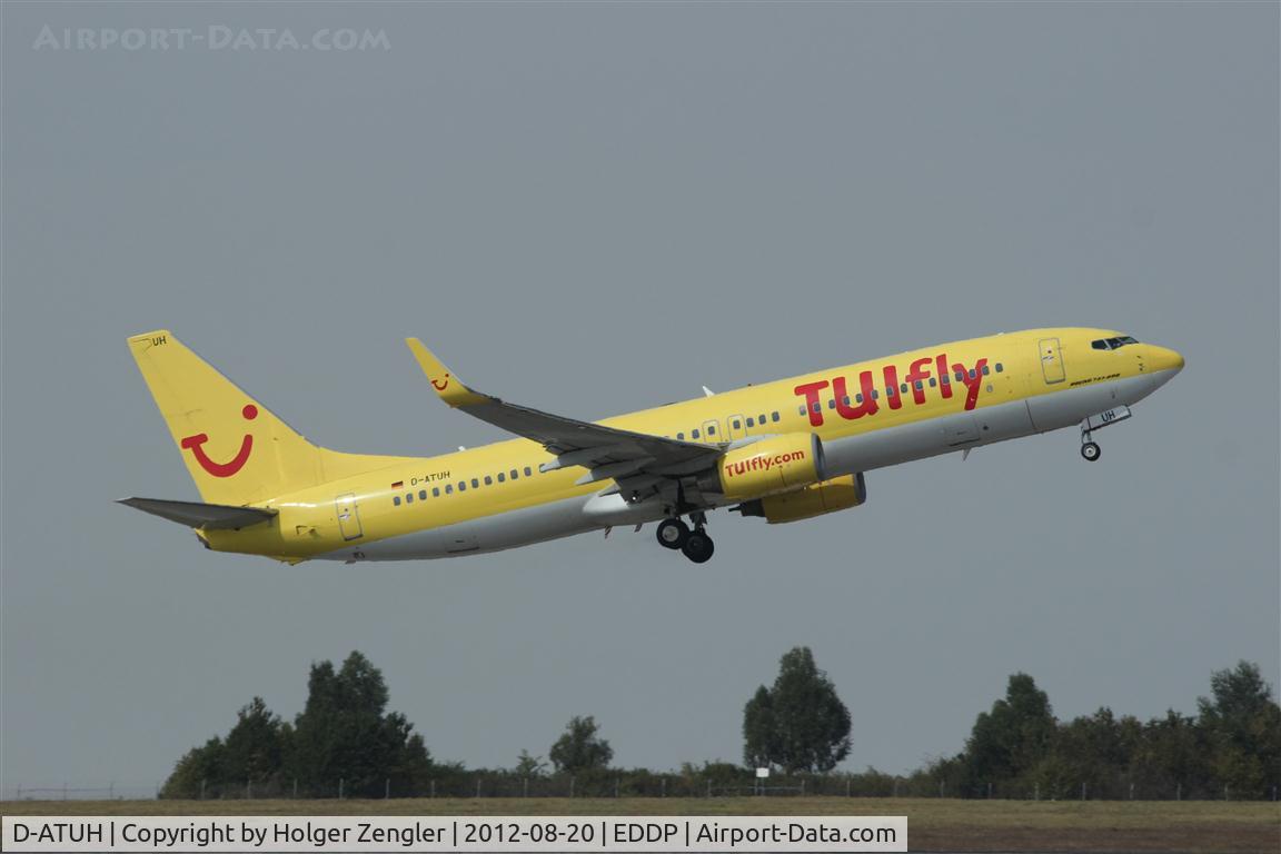 D-ATUH, 2006 Boeing 737-8K5 C/N 34689, A canary bird of TUIfly departs on rwy 08L.....