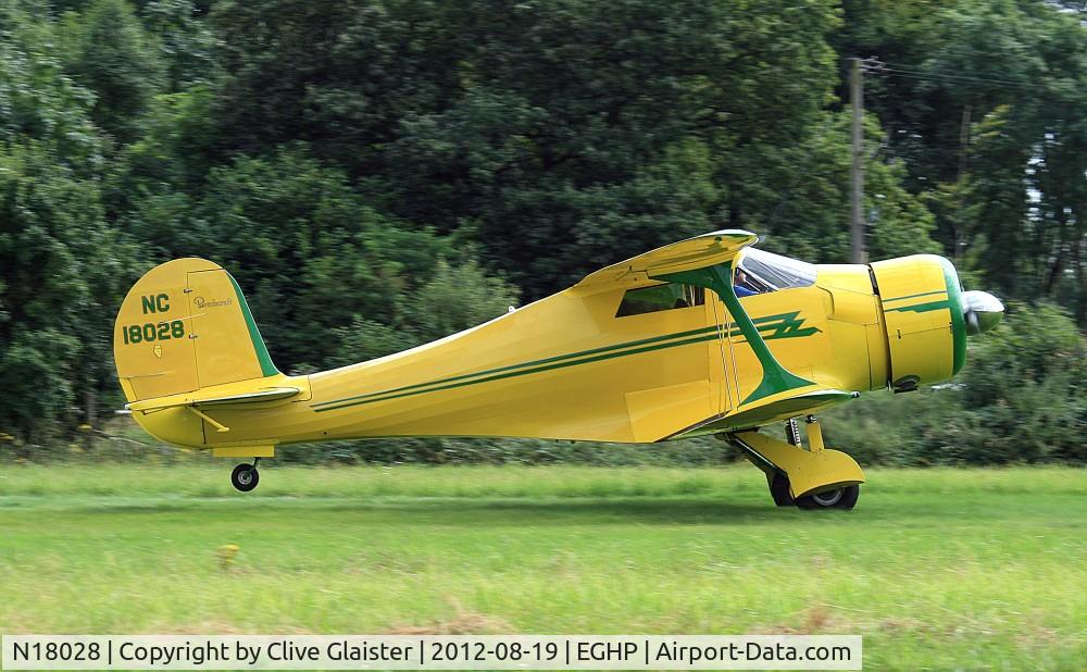 N18028, 1937 Beech D17S Staggerwing C/N 147, Popham (EGHP) based Beech D17S departing.