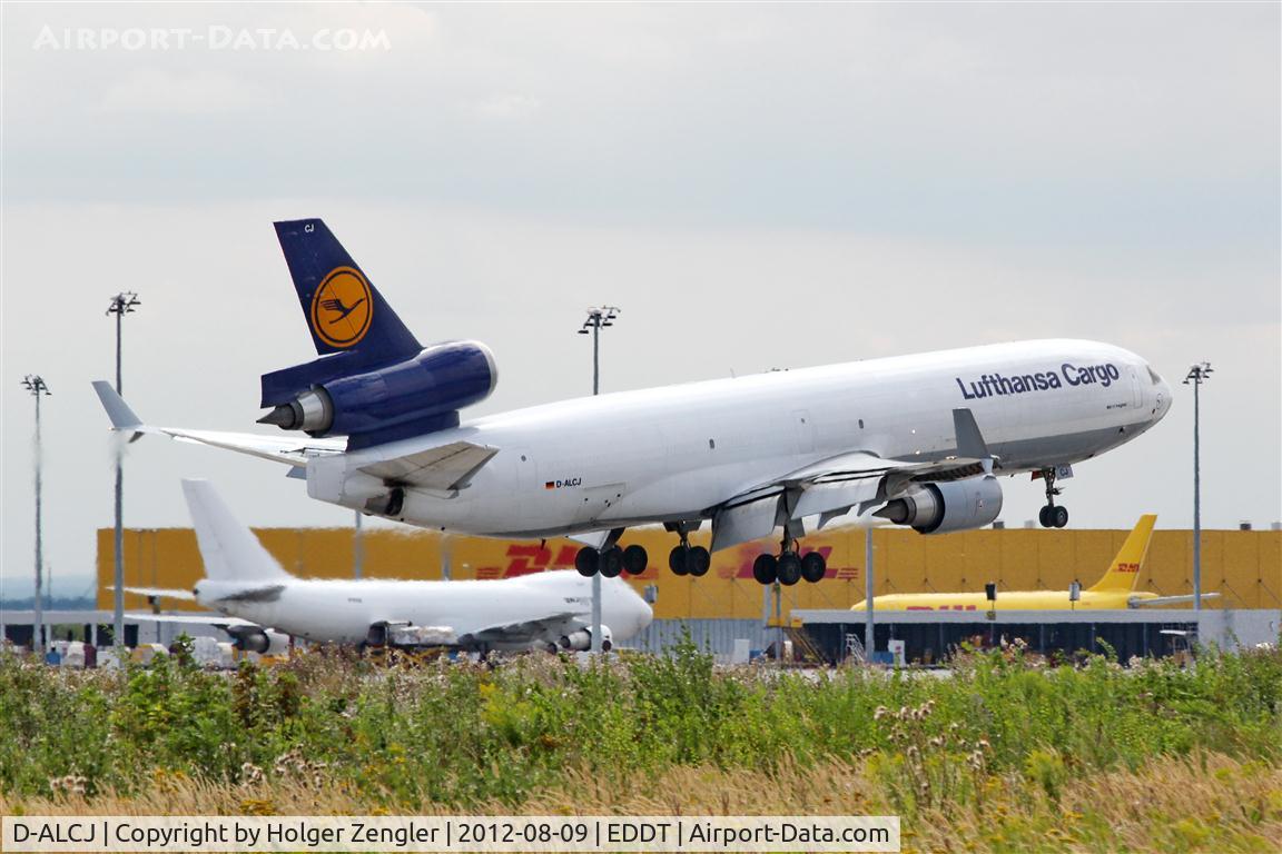 D-ALCJ, 2000 McDonnell Douglas MD-11F C/N 48802, Very final on rwy 26L.....