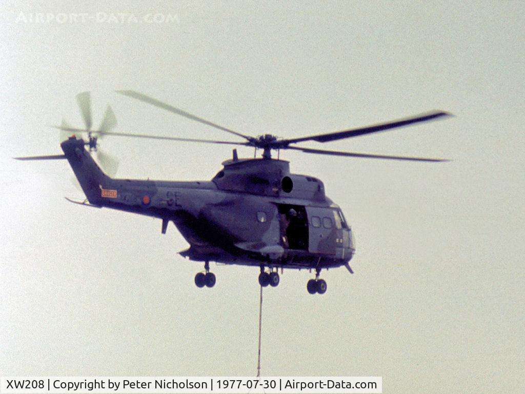 XW208, 1971 Westland Puma HC.1 C/N 1095, Puma HC.1 of 33 Squadron with under-slung load on display at the 1977 RAF Finningley Airshow.