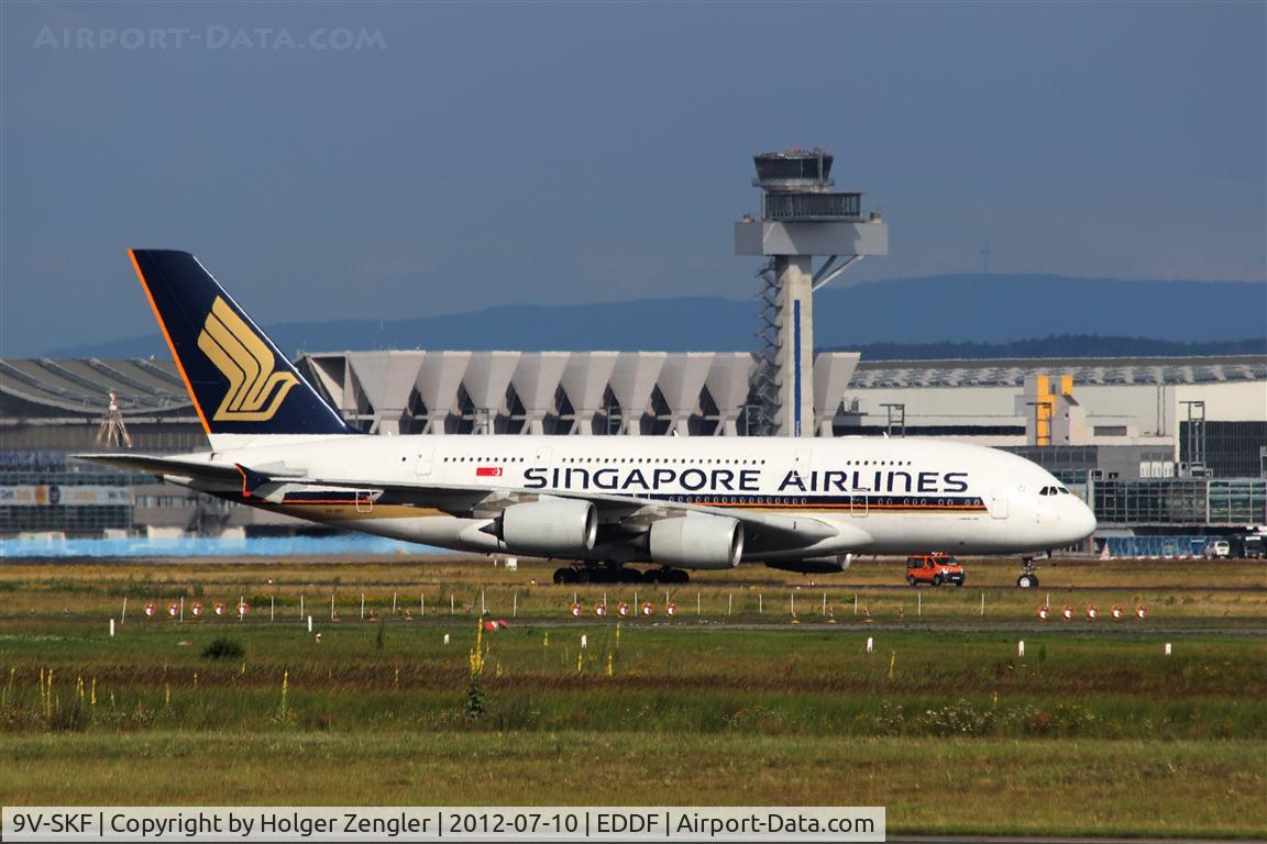 9V-SKF, 2008 Airbus A380-841 C/N 012, Being guided to parking position.....