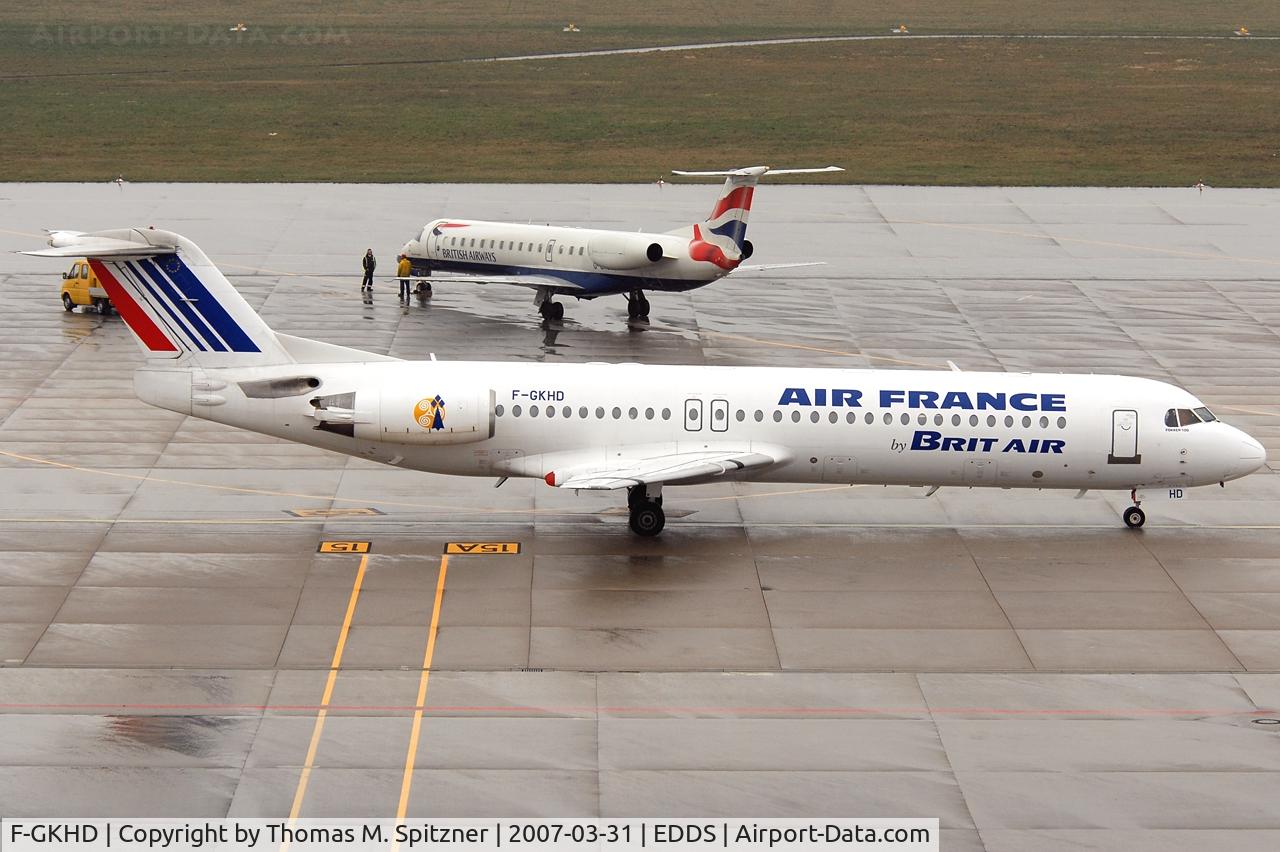 F-GKHD, 1992 Fokker 100 (F-28-0100) C/N 11381, Air France by Brit Air F-GKHD awaiting it's taxi clearance after being pushed back.