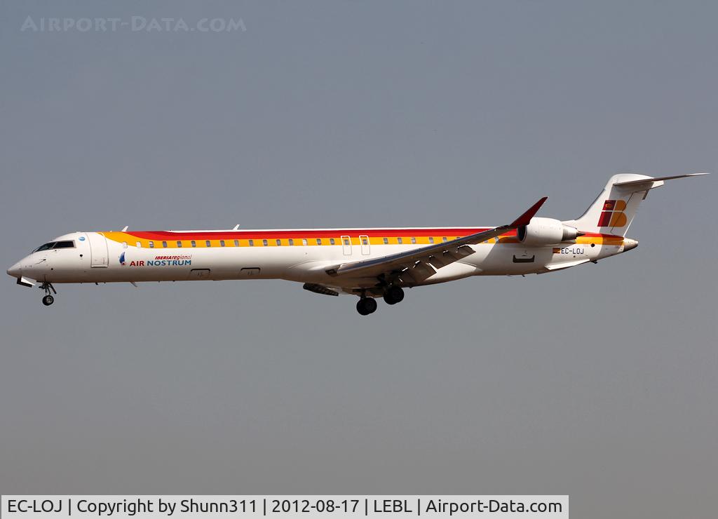 EC-LOJ, 2011 Bombardier CRJ-1000ER NG (CL-600-2E25) C/N 19018, Landing rwy 25R