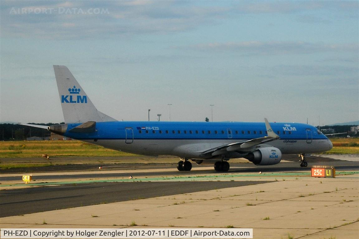 PH-EZD, 2009 Embraer 190LR (ERJ-190-100LR) C/N 19000279, Lining up for take-off on rwy 25C.....