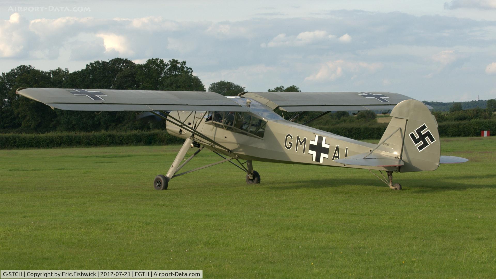 G-STCH, 1942 Fieseler Fi-156A-1 Storch C/N 2088, 1. G-STCH at Shuttleworth Sunset Air Display, July 2012