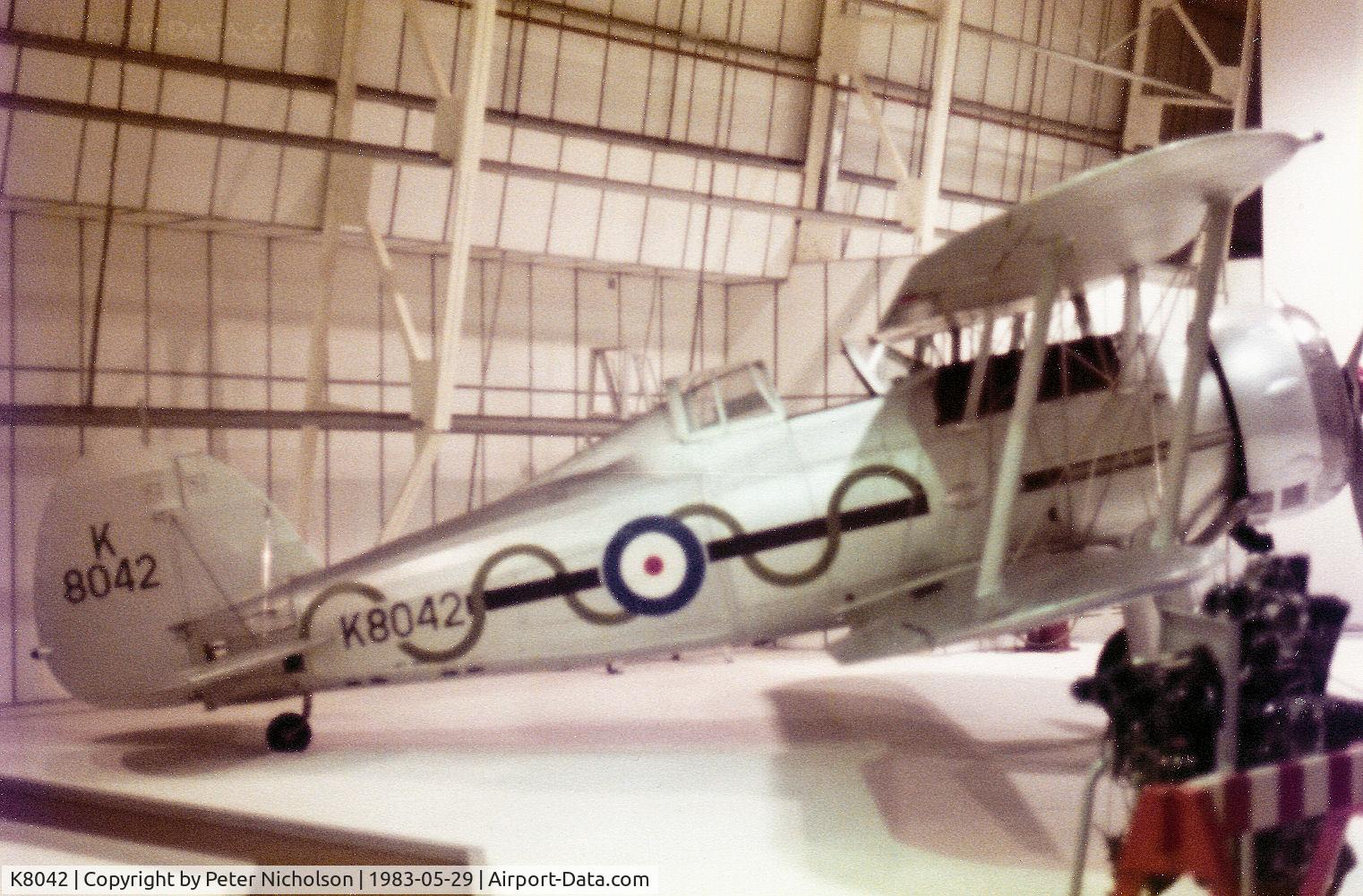 K8042, Gloster Gladiator Mk1 C/N Not found K8042, Gladiator 1 as displayed at the Royal Air Fiorce Museum at Hendon in the Summer of 1983.
