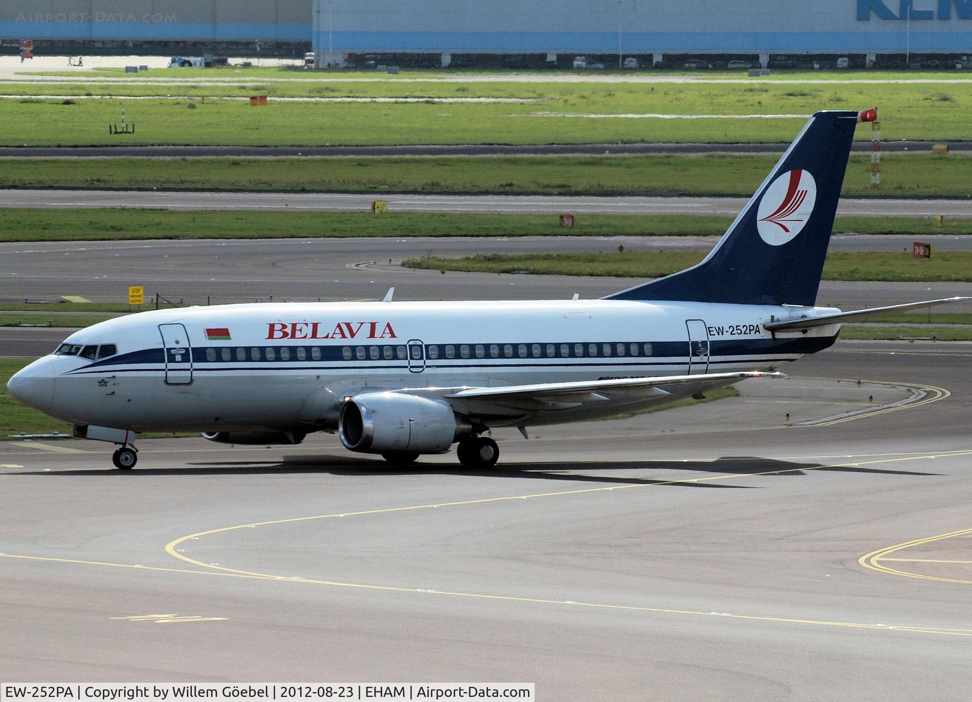 EW-252PA, 1996 Boeing 737-524 C/N 26340, Taxi to runway 24 of Schiphol Airport for take off.