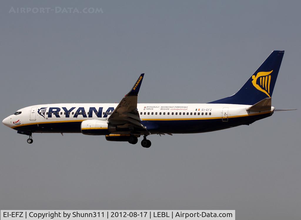 EI-EFZ, 2009 Boeing 737-8AS C/N 38489, Landing rwy 25R with additional 'Bygdoszcz Torun / Kujawsko Pomorskie Region / centralpoland.pl' titles