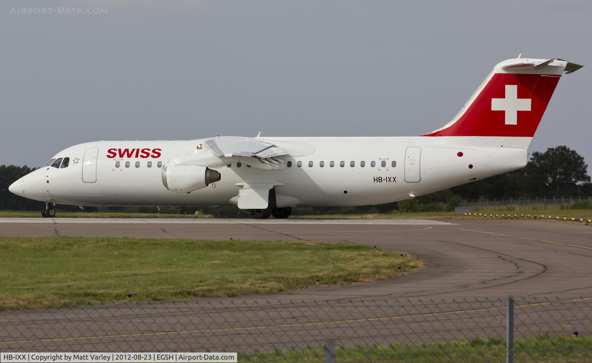 HB-IXX, 1995 British Aerospace Avro 146-RJ100 C/N E3262, Departing after spray by Air Livery.
