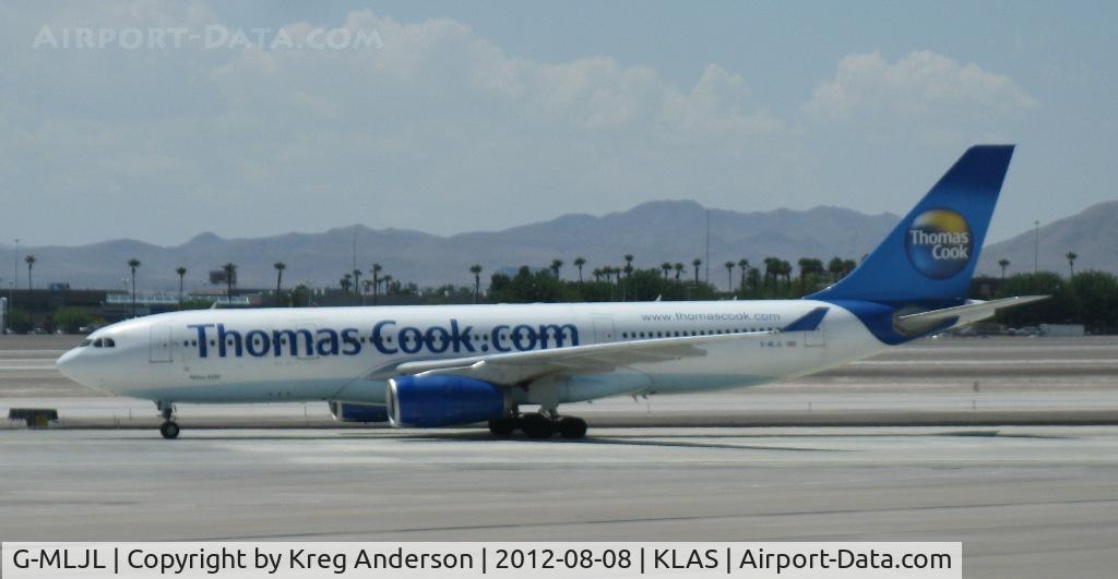 G-MLJL, 1999 Airbus A330-243 C/N 254, Thomas Cook Airlines Airbus A330-200 taxiing at KLAS.