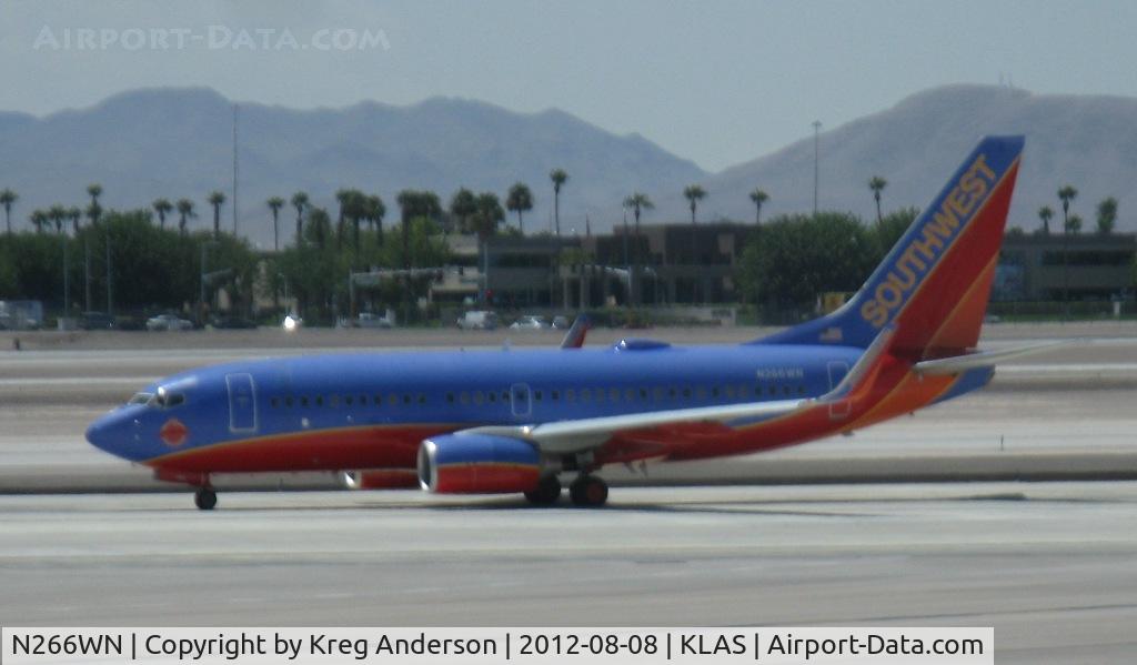 N266WN, 2007 Boeing 737-7H4 C/N 32523, Southwest Airlines Boeing 737-700 taxiing at KLAS.