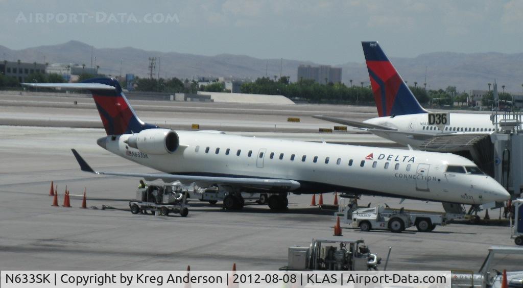 N633SK, 2011 Canadair CL-600-2C10 Regional Jet CRJ-700 C/N 10331, Delta Connection Bombardier CRJ-700 at the gate.