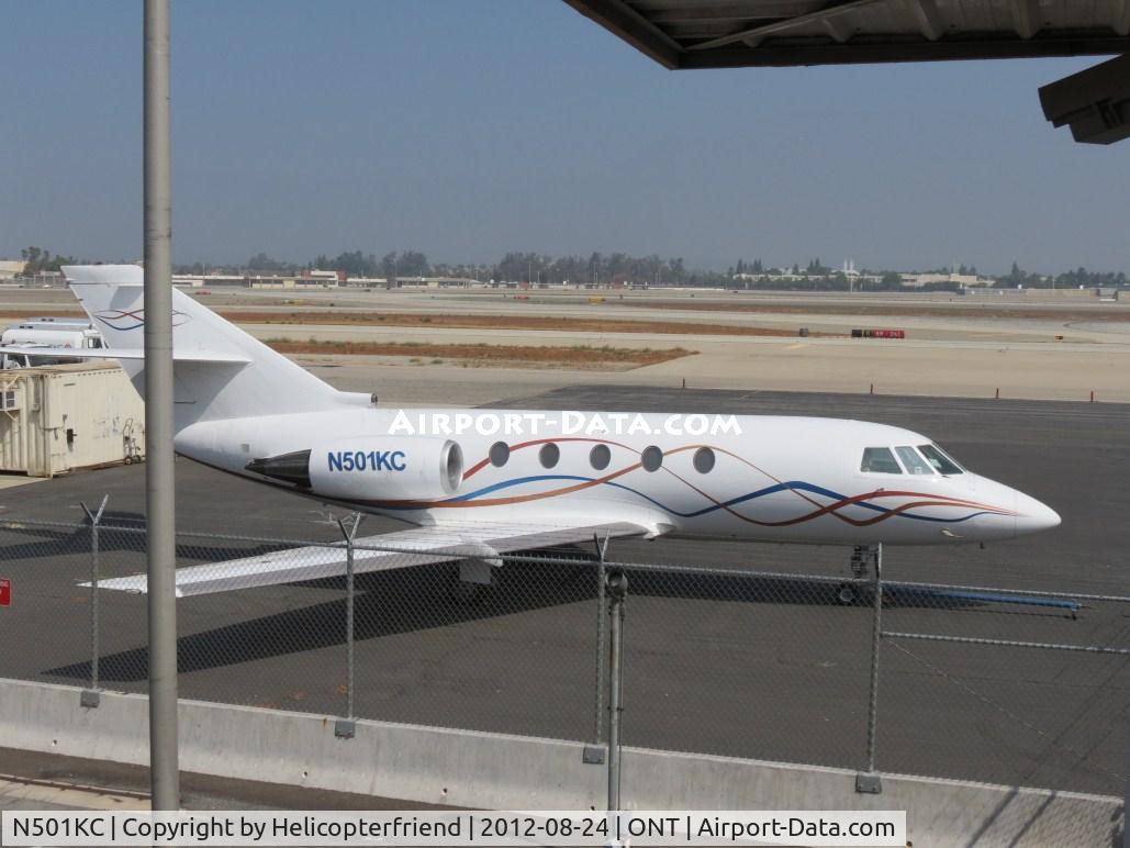 N501KC, 1982 Dassault Falcon 200 (20H) C/N 401, Parked by the fence at Atlantic Executive terminal