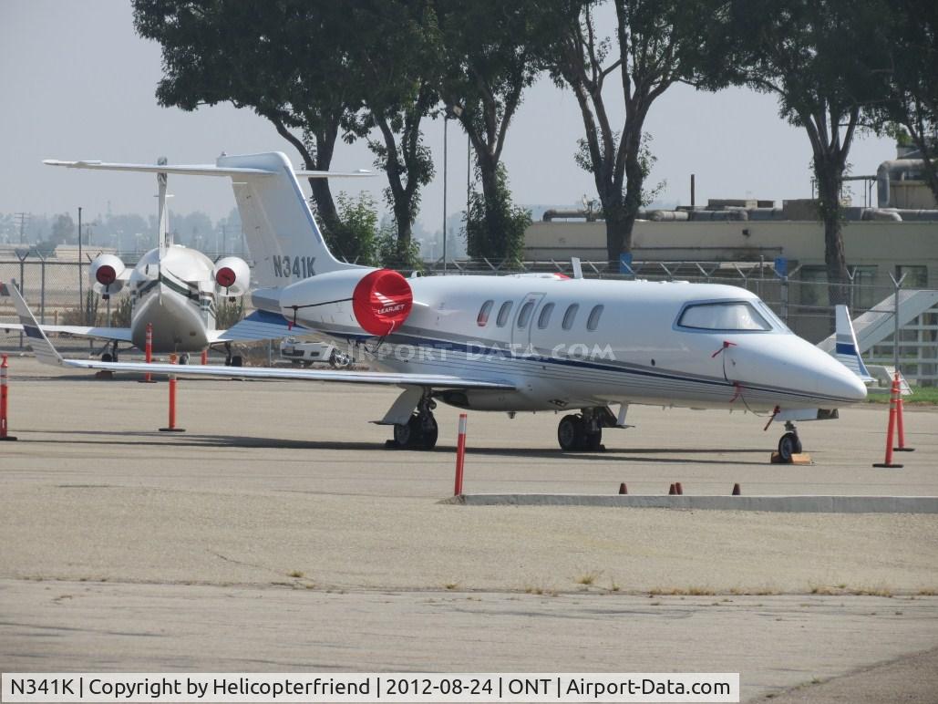N341K, 2001 Learjet Inc 45 C/N 157, Parked in Guardian parking area
