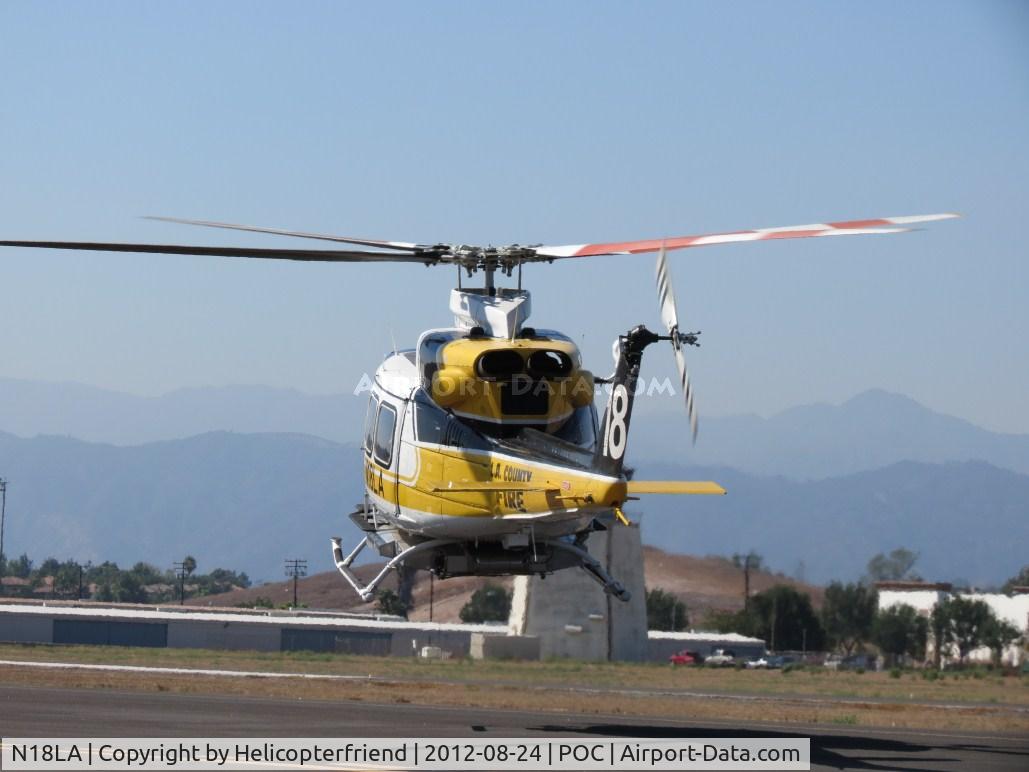 N18LA, 1992 Bell 412 C/N 36043, air taxiing to taxiway Sierra for a westerly departure