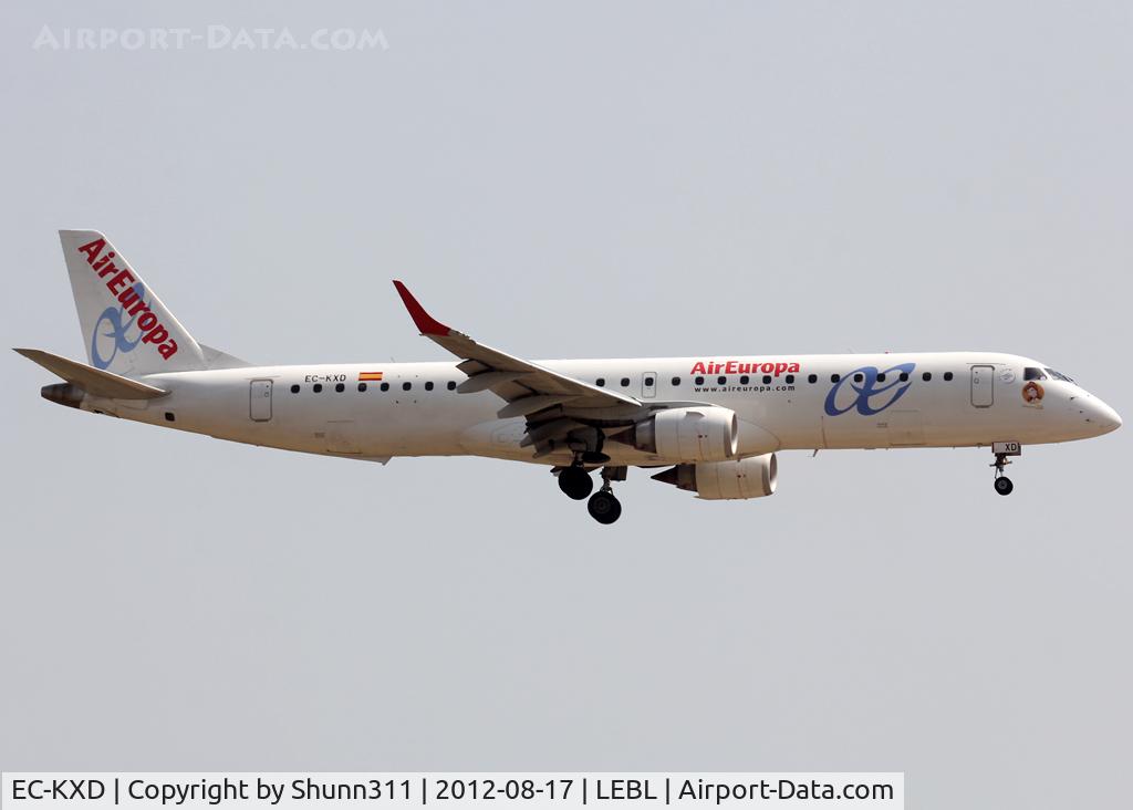 EC-KXD, 2009 Embraer 195LR (ERJ-190-200LR) C/N 19000244, Landing rwy 25R with additional small Disneyland 20th anniversary patch on nose...