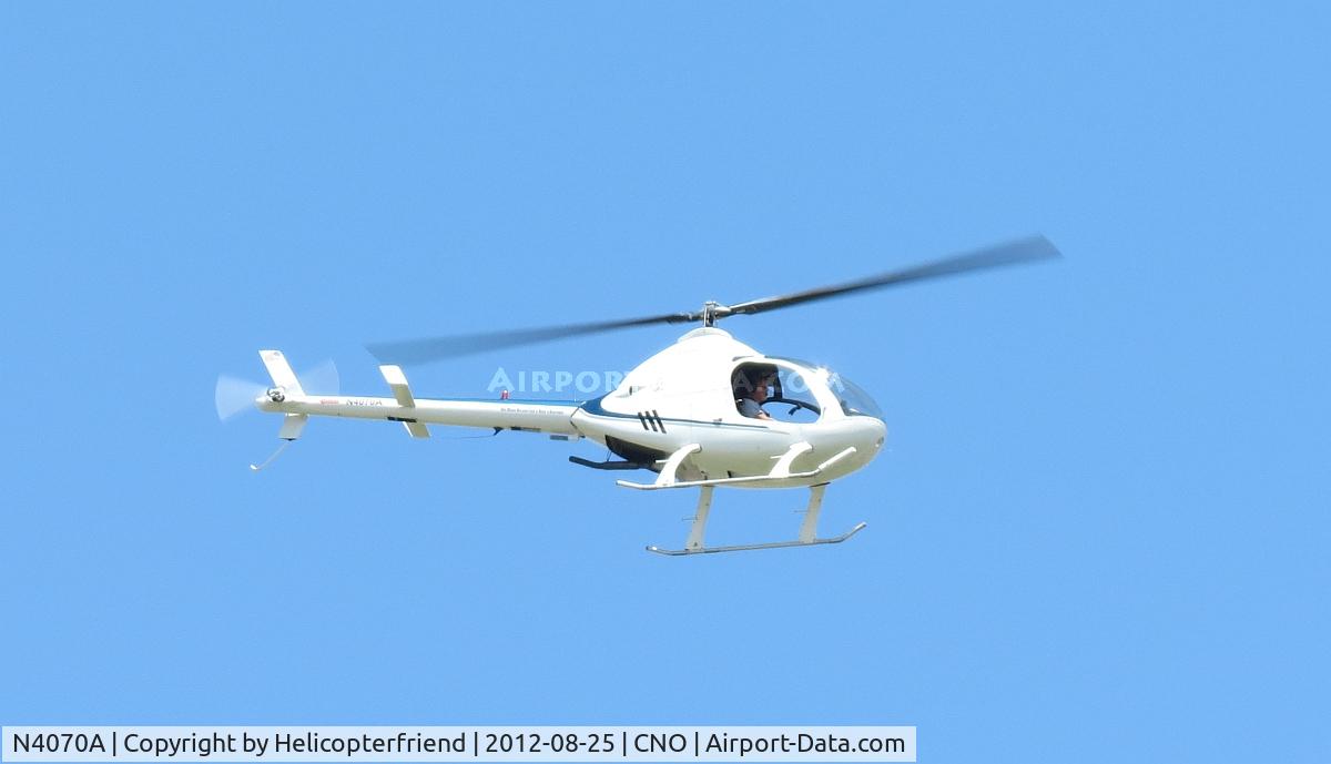 N4070A, 2004 Rotorway Exec 162F C/N 6345DS, On downwind leg north of the airport